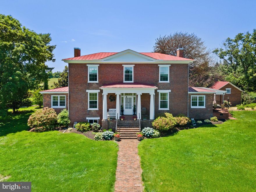 Nestled in the heart of Culpeper, Virginia, just southeast of the town center along Route 15, lies Val Verde, also known as Green Valley Farm—a cherished historic estate spanning 148 acres. Steeped in heritage and revered as a working farm for generations.
Boasting beautiful rolling pastures, this remarkable property features essential farm infrastructure, including a substantial 60x180 free span Morton workshop and equipment shed, a 42x90 Morton hay barn, and a 36x90 livestock barn with a loft—each contributing to the functionality and productivity of the farm.
The crowning jewel of Val Verde is its stately pre-Civil War era residence, originally constructed in 1835 by Thomas Nalle, paymaster of the US Navy. This historic home, once served as General Pope’s headquarters during the battle of Cedar Mountain and later as a hospital during the Civil War, embodies timeless elegance and architectural significance. The original structure, crafted in the Federal Design tradition, showcases meticulous hand-pressed bricks laid in Flemish Bond, while two thoughtfully designed additions seamlessly integrate with the original dwelling, offering a harmonious blend of historic charm and contemporary comfort.
Within the residence, distinguished features include 14-foot walls, 12-foot ceilings, and exquisite heart pine floors, accentuated by a grand entrance hall, regal staircase, and an light filled English basement. Overlooking a serene pond, the residence exudes an aura of tranquility and refinement, providing an idyllic setting for gracious living and entertaining.  
Complementing the main residence are a three-bedroom tenant house and a cozy one-bedroom guest cottage, offering additional accommodations for guests or extended family members, thereby enhancing the estate’s versatility and appeal.
 Val Verde stands as a testament to timeless elegance, historical significance, and modern functionality—a rare opportunity to own a piece of Virginia’s rich heritage and create lasting memories for generations to come.