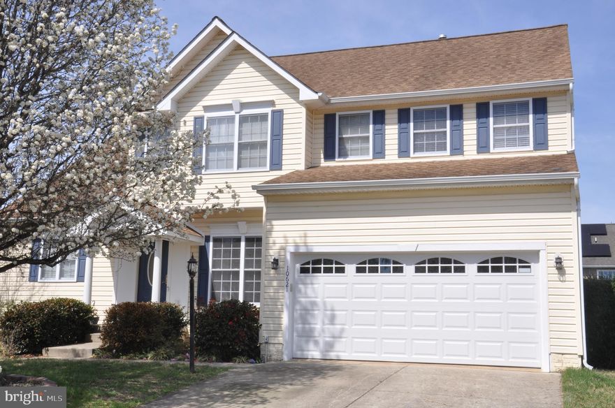 This well‑maintained Colonial in Belmont at Carmel Church offers a main‑level primary bedroom with an en‑suite bath that includes a soaking tub and separate shower. The main level features hardwood flooring, a center‑island kitchen with table space, and a living area with a gas fireplace. Three additional bedrooms and a full bath are located on the upper level. The home includes natural gas utilities, public water and sewer, and a two‑car garage with interior access. A fenced rear yard provides outdoor space, and the full unfinished basement with outside access and rough‑in plumbing offers options for future expansion. Located about one mile from I‑95, the property provides convenient access to restaurants, services, and commuter routes.