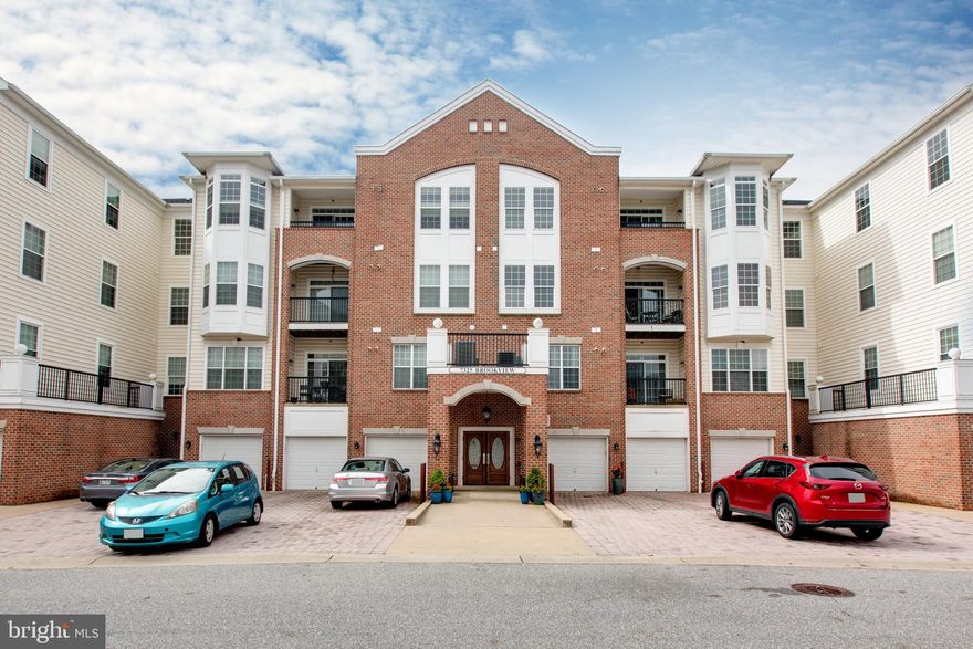 Absolutely remarkable corner unit condo in the sought after Gatherings at Lyndwood, a premier active adult community offering a clubhouse with a fitness center, outdoor pool, tennis courts, gazebos, grills and walking paths. Close to everything you need with amenities such as a secured building lobby with an elevator and a garage with inside access. Enjoy the best of one level living with spacious rooms, sun drenched windows, tray ceilings and more. The welcoming living room invites you in and the cozy den is perfect for a reading nook or tv room. The formal dining room is large enough to accommodate any size table for gatherings large or small. Prepare your favorite meals in the kitchen fully equipped with stainless steel appliances, granite countertops, decorative tile backsplash, 42” cabinets, storage panty and an open breakfast room. Tranquility awaits you in the primary bedroom suite boasting a massive walk-in closet and a luxurious bathroom complete with a glass enclosed tile shower, a jetted soaking tub and a dual vanity. Another bedroom and a full bathroom on the other side of the unit offer privacy. The office could also be used as a possible third bedroom. A convenient laundry room also provides storage. 
 microwave/2022,Washer/Dryer/2022,New paint/2022.