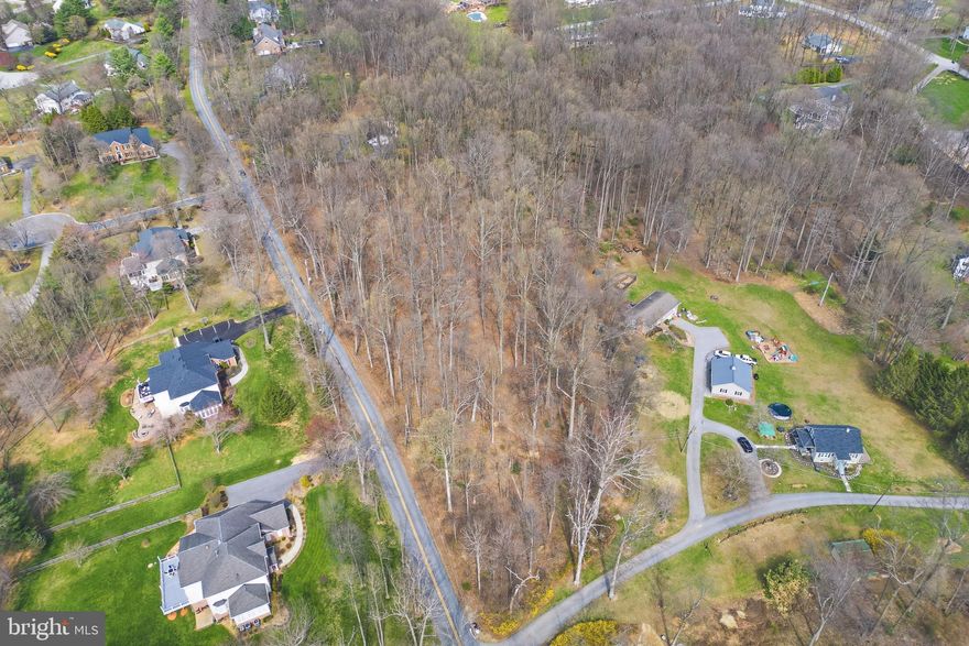 LOCATION! LOCATION! LOCATION MEETS OPPORTUNITY, LIFE BY DESIGN, & FUTURE INVESTMENT! This home currently sits on 6.6. acres.  This listing is for once the lot is sub-divided and is priced for when  it will sit on a fabulous 2 acre level lot of natural beauty. Solid  built home with better than great bones and one level living that is begging to be everything you ever imagined.  NOTE: The 6.6 acres can be sold as one parcel as advertised in another listing.  (see mls # MDBC2157880) We have been told by many reliable sources this land is zoned RC-5 and is sub-dividable and has the ability to accommodate horses. Please do your own due diligence as the owner and broker do not carry the final authority. Option 1: Wait for the land to be subdivided and buy the rancher on roughly 2 acres.  Option 2: remodel the existing home and have 6.6 Acres of privacy & tranquility in the very desirable Worthington Valley, Falls Road and Greenspring Valley corridors.  (see mls # MDBC2157880) Option 3: keep the house and 4 acres and save, sell off, or develop 2.6 acres for yourself or a family member.  Option 4: keep the house on 2 acres and save, develop, or sell off 2- 2 acre lots.  Anyway you slice it (or don't) this land has wealth potential in it's immediate and future value we can't even begin to understand.