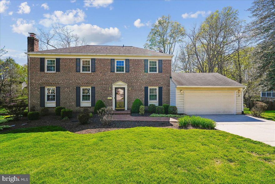 YOUR NEXT CHAPTER BEGINS HERE! NESTLED ON A PRIVATE LOT BACKING TO MATURE TREES, THIS BRICK-FRONT COLONIAL OFFERS A WONDERFUL BLEND OF COMFORT, SPACE, AND INVITING INDOOR-OUTDOOR LIVING.  STEP INSIDE TO HARDWOOD FLOORS THAT FLOW THROUGH THE FORMAL LIVING AND DINING ROOMS, ACCENTED BY CHAIR RAILING AND CROWN MOLDING, CREATING THE PERFECT SETTING FOR HOLIDAYS AND MORE ELEGANT GATHERINGS. THE RENOVATED EAT-IN KITCHEN FEATURES GRANITE COUNTERTOPS, STAINLESS STEEL APPLIANCES, AND AMPLE CABINETRY, AND OPENS TO THE FAMILY ROOM WITH A GAS FIREPLACE FLANKED BY BUILT-IN SHELVING, PROVIDING A WARM AND INVITING SPACE TO RELAX.  FROM THE FAMILY ROOM, STEP OUT TO THE CUSTOM SCREENED-IN PORCH WITH TWO SKYLIGHTS, OFFERING BEAUTIFUL NATURAL LIGHT AND ACCESS TO THE DECK WITH STAIRS, IDEAL FOR DINING AL FRESCO OR ENJOYING QUIET EVENINGS SURROUNDED BY TREES AND NATURE. A MAIN-LEVEL STUDY ADDS FLEXIBILITY AND IS PERFECT FOR THOSE WORKING FROM HOME.  UPSTAIRS, HARDWOOD FLOORS CONTINUE INTO THE PRIMARY SUITE, WHICH FEATURES A COMFORTABLE SITTING AREA, LARGE WALK-IN CLOSET, AND A RENOVATED PRIMARY BATH WITH TILE FLOORS AND A STAND-ALONE SHOWER. THREE ADDITIONAL BEDROOMS AND A FULL BATH WITH TILE FLOORS AND A JETTED TUB/SHOWER COMBINATION COMPLETE THE UPPER LEVEL.  THE WALK-OUT LOWER LEVEL EXPANDS THE LIVING SPACE WITH A LARGE RECREATION ROOM FEATURING TILE FLOORS AND A CORNER BRICK-SURROUND WOOD-BURNING FIREPLACE WITH MANTEL, PERFECT FOR CASUAL ENTERTAINING OR COZY NIGHTS AT HOME. THIS LEVEL ALSO INCLUDES A FIFTH BEDROOM, FULL BATH WITH STAND-ALONE SHOWER, A LAUNDRY ROOM WITH SIDE-BY-SIDE WASHER AND DRYER AND UTILITY SINK, A WORKSHOP AREA, AND ACCESS TO A PRIVATE PATIO.  WITH MULTIPLE OUTDOOR SPACES, A PRIVATE SETTING, AND A THOUGHTFUL FLOOR PLAN, THIS HOME OFFERS COMFORT, FUNCTIONALITY, AND A BEAUTIFUL PLACE TO CALL HOME. SOME UPDATES/IMPROVEMENTS INCLUDE: DISHWASHER (2021), STOVE & REFRIGERATOR (2018), ROOF (2015), DRIVEWAY (2011), HOT WATER HEATER (2004), FURNACE/AC (2003)