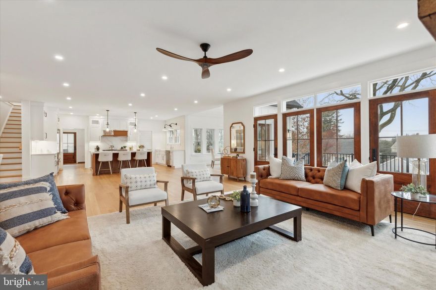 Welcome to 225 Bella Vista Rd, an exquisite custom-built modern farmhouse that redefines contemporary living. Nestled within the prestigious TE School District, this residence epitomizes the convenience of a "walk-to" lifestyle, with proximity to the Devon Train Station, Devon Yard (featuring Anthropologie, Terrain Café, Vetri), Whole Foods, Pour Richard’s Coffee, and the Devon Horse Show Grounds.  Marvel at the striking white board & batten farmhouse siding, harmoniously paired with architectural shingles and a standing seam metal roof. The large modern windows not only enhance curb appeal but also infuse the home with natural light. Step onto the welcoming covered front porch, adorned with a custom vaulted ceiling, intricate architectural details, ceiling fans, and bespoke lighting – an ideal spot for serene morning or evening gatherings.  Boasting 4 bedrooms, 3 full baths, 2 half baths, and a generous 6,400 sqft of living space, this residence also features a 3-car garage. Upon entering, be captivated by the wide plank white oak hardwood floors that grace the open-floor plan. Quality finishes, tasteful design choices, 9 ft ceilings, a seamless quartz slab fireplace surround, solid wood doors, and stylish light fixtures contribute to the home's sophisticated ambiance. The main level unfolds with a sun-filled office and a conveniently located powder room. To the left, a formal dining room with wainscoting wall detail and an eye-catching light fixture sets the stage. The fully equipped butler’s pantry leads to the heart of the home – a gourmet kitchen open to the family room, an ideal layout for entertaining. The dream kitchen features a large natural wood island with bar stool seating, custom quartz slab backsplash, and wood detailing on the range. Top-of-the-line stainless steel appliances, classic white subway tile, shiplap walls, and two custom farmhouse sinks add to the kitchen's allure. The breakfast room, with a vaulted shiplap ceiling and impressive light fixture, seamlessly connects to the outdoor deck, creating the ultimate indoor/outdoor entertaining space.  The second level hosts the primary suite and three secondary bedrooms. The primary suite is an in-home oasis with a spacious bedroom, a bonus multi-purpose room, private coffee bar, two walk-in closets, and a luxurious primary bath with a floating tub, rainfall walk-in shower, and dual vanities with quartz counters. Two bedrooms share a jack & jill bathroom, while the fourth bedroom boasts an ensuite bathroom – all featuring custom closets and ceiling fans.  A finished walk-out basement with 9ft ceilings provides additional living space or a game room, with rough plumbing for an additional bathroom. The property also includes an irrigation system and extensive landscaping/hardscaping. Positioned on the Devon Horse Show Parade Route and a short drive to KOP Town Center and Valley Forge Park, this custom home in a highly desirable location is not to be missed!