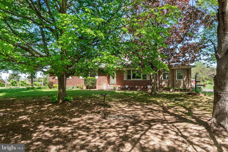 Welcome to 2225 Harney Road, Littlestown, PA — A Countryside Home Full of Charm and Comfort
Discover a rare opportunity to embrace country living without sacrificing comfort at this beautiful 4-bedroom, 2.5-bath all-brick rancher, set on 4.77 acres of pristine, open landscape. Designed for those who appreciate both refined living and the peacefulness of rural surroundings, this home offers a lifestyle that is both inviting and inspiring.
The main level is thoughtfully laid out with gleaming hardwood floors and spacious, sun-drenched rooms that create a warm and welcoming atmosphere. The country-style kitchen is a centerpiece of the home, featuring stainless steel appliances and generous space for gathering. The primary suite offers privacy and relaxation, while three additional bedrooms provide ample space for family, guests, or a home office. Every corner of this home is filled with thoughtful details that blend everyday function with timeless style.
The fully finished walkout basement expands the living area with a large family room, laundry space, and an additional flexible room, once used as a fifth bedroom. Whether hosting guests, working remotely, or simply enjoying family life, the spaces throughout this home are designed to fit your needs with ease.
Step outside to enjoy the best of country living. A charming three-season sunroom and a private rear porch overlook rolling pastures and scenic vistas, offering the perfect backdrop for morning coffee, evening gatherings, or simply unwinding after a full day. The surrounding property enhances the lifestyle, with a well-appointed barn, horse stalls, paddock, and additional outbuildings ready for your personal vision — whether it be equestrian pursuits, hobby farming, or simply enjoying the beauty of wide-open space.
2225 Harney Road is more than just a property — it’s a home that offers room to breathe, grow, and create the life you’ve always imagined.
Schedule your private showing today and experience for yourself the comfort, warmth, and beauty of this exceptional countryside residence.