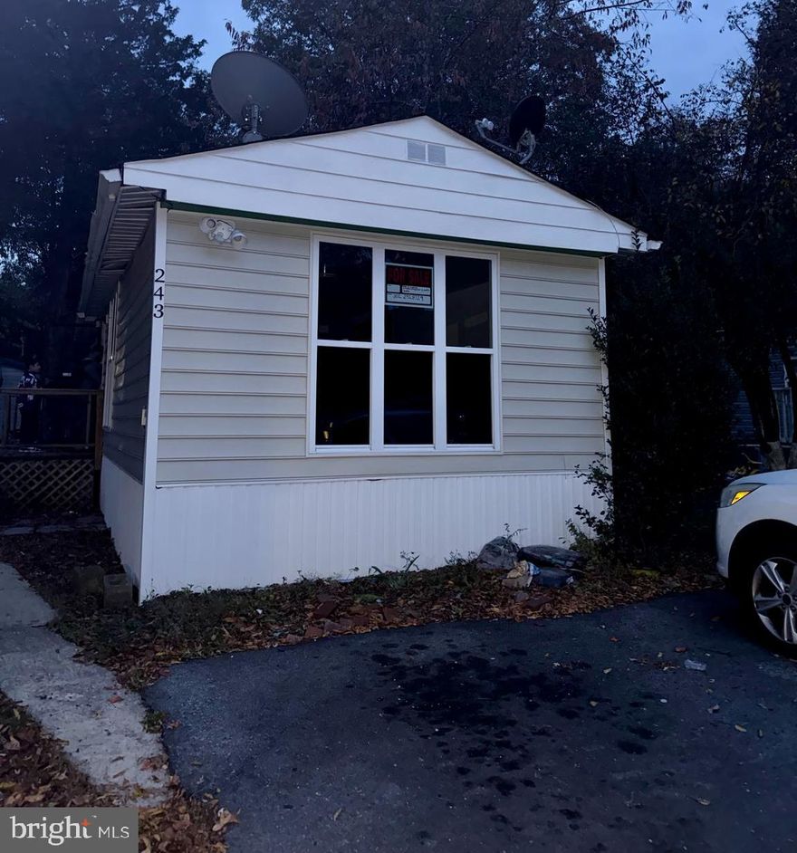 Well-maintained mobile home offering comfortable and affordable living in a convenient location. This home features a functional layout with ample living space and natural light throughout. Close to shopping. Buyer must be approved by park management; ground rent applies. Financing options available through 21st Mortgage, a lender specializing in manufactured and mobile home loans. Great opportunity for owner-occupants seeking affordable homeownership. Buyer must be approved by park management. Ground rent applies.