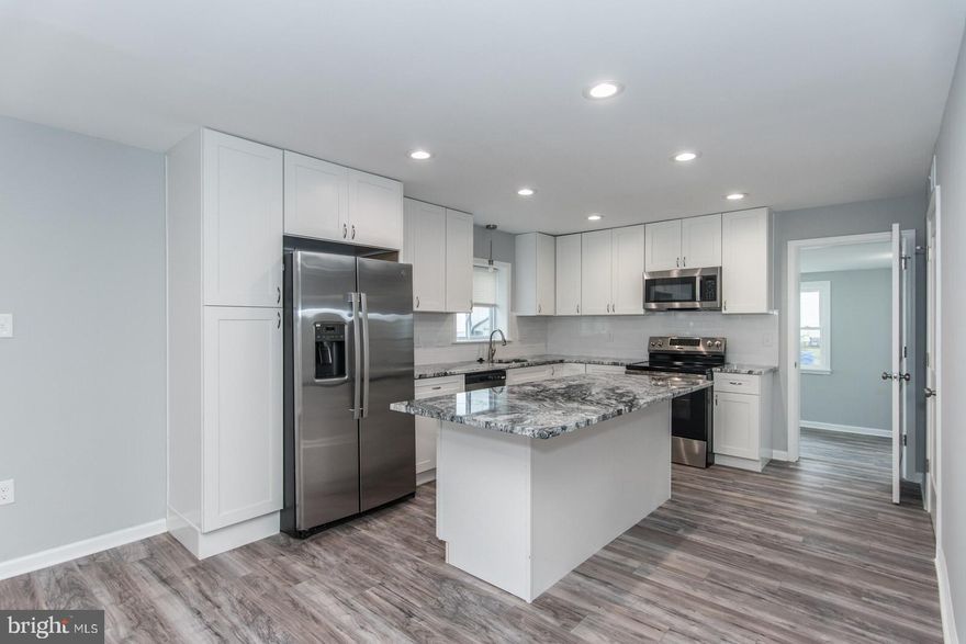LOOK NO FURTHER!!! Here is your opportunity to purchase a completely updated end unit 3BR, 1.5 Bath townhome with a fenced in yard, off-street parking, shed and wrap around deck that is great for entertaining. The low taxes make this home great for investors looking for an income producing property or for buyers looking for a home to fit their budget in the Bucks County area.  First floor features new laminate flooring and fresh paint throughout living/dining area with large casement windows for lots of natural lighting. The newly updated kitchen features new white shaker cabinets, granite countertops, subway backsplash, and new stainless-steel appliances. There is a ½ bath off the kitchen along with a Laundry/mechanics room that has washer/dryer hookup. Off the kitchen at the back of the house there is a freshly painted sunroom with large windows that allow natural lighting and is great for relaxing or making a playroom. On the 2nd floor you will find 3 great-sized bedrooms with ceiling fans and a newly renovated hall bathroom. The Exterior features new vinyl siding, shingles, and flat roof. This home is conveniently situated near major roads, (I-95 and PA/NJ turnpikes) local highways, NJ bridges, train stations, schools and shopping. This is the perfect home for your rental portfolio or to call home. Make your appointment today and call it home tomorrow!