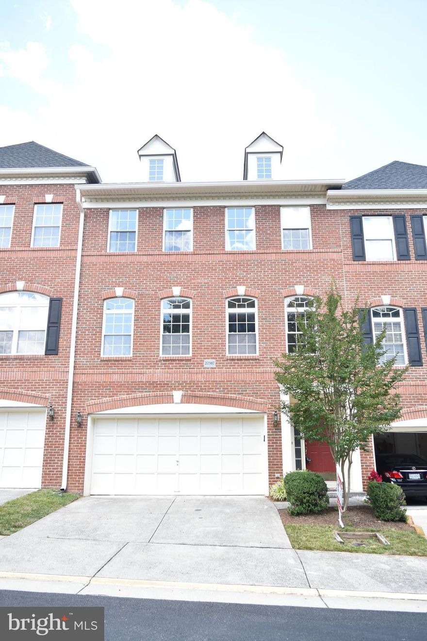 Must-see 3-level townhome in desirable Lowes Island, offering over 2,700 sq. ft. of living space. This beautiful home features 3 bedrooms, 2 full baths, and 2 half baths, including a rare main-level primary bedroom suite.

Enjoy hardwood floors throughout, a cozy gas fireplace, and an attached 2-car garage. The practical layout includes a convenient upper-level laundry room. The home is set in a tranquil location, surrounded by parkland and woods.

Please note: Photos were taken prior to the current tenant's occupancy.
                             Tenant Occupied. A 24-hour advance notice is strictly required.

Policy: No pets and no smoking permitted.