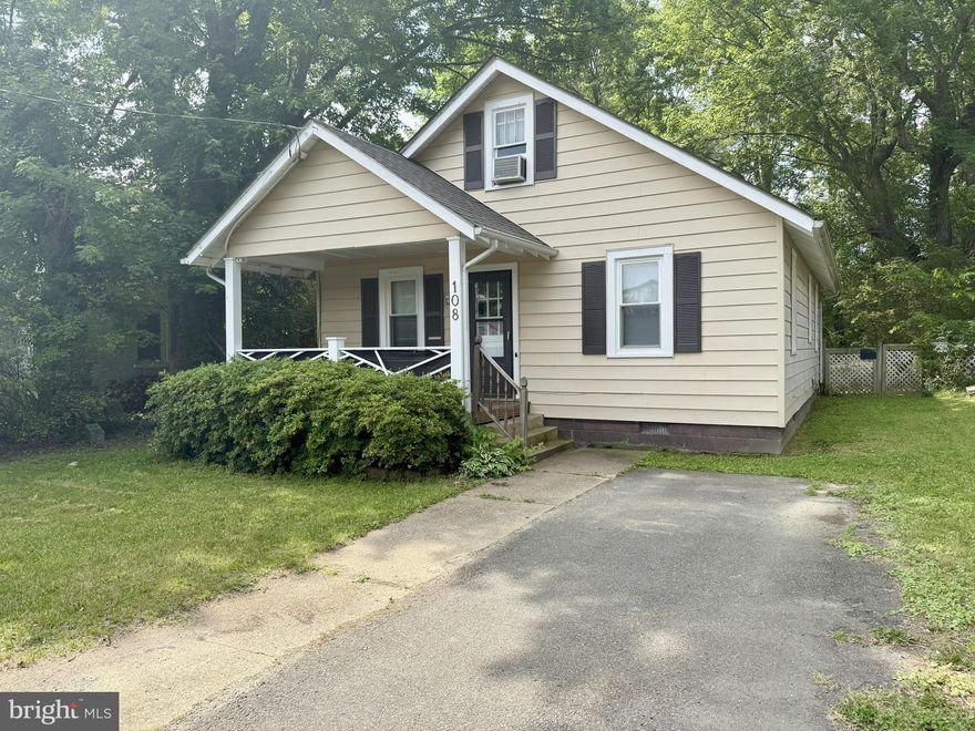 Charming 2 bedroom one bath cottage, centrally located. Home will be professionally cleaned between tenants. Features wood flooring throughout. Separate dining and living room areas. Walk through kitchen to laundry room with washer/dryer provided as is. 2 spacious bedrooms/ 1 full bathroom. Additional unfinished attic space with stair access. Large backyard and off street/ driveway parking. Sorry no cats only dogs under 25 lbs