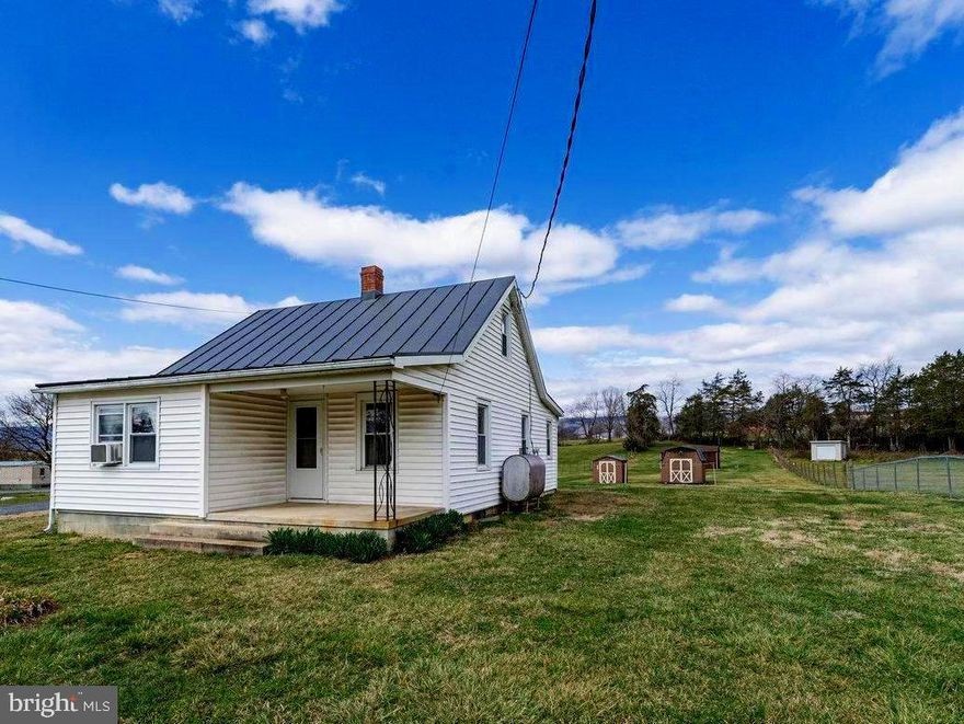 This cozy and quaint 2-bedroom, 1-bathroom farmhouse offers the perfect blend of country charm and close-to-town convenience. This home benefits from no Town taxes while still being close to Luray High School, shopping, restaurants, and entertainment. The main floor features a primary bedroom and bathroom for easy accessibility and one-level living, while the additional bedroom on the upper level includes built-in storage, adding both charm and functionality. A welcoming eat-in kitchen provides the perfect space for casual meals, and the living room offers a sizeable place to relax and entertain. Beautiful hardwood floors throughout most of the home, including beneath the carpet, are waiting to be uncovered. Outside the nearly level backyard offers space for outdoor enjoyment, complemented by several storage sheds with power for all your hobbies. The property is zoned commercial which provides additional development / use opportunities. This farmhouse is full of character while offering modern comforts in a fantastic location. Do not miss your chance — schedule your showing today!
All offers will be reviewed Wednesday evening  March 26th