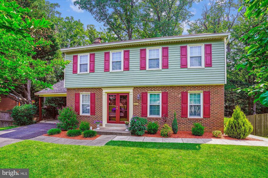 Back on the market!  Now is your chance to buy this classic brick colonial tucked into a quiet cul-de-sac in Alexandria's beloved Franconia Forest neighborhood. With thoughtful renovations throughout, a lush, private setting and no HOA, this 5-bedroom, 3.5-bathroom home invites you to settle in and stay awhile.
Step through French doors and into the welcoming foyer, where gleaming floors, fresh paint, and natural light guide you through a flowing floorplan. The formal living room is a nice place to greet guests, and the formal dining room is perfect for family dinners or hosting friends. The spacious kitchen is the heart of the home, offering plenty of counter space and cabinetry for everyday cooking and entertaining and is open to a large family room with a cozy fireplace, ideal for relaxed evenings. Just off the family room is a stunning sunroom addition with floor-to-ceiling windows, offering tranquil views of the wooded backyard, making you feel as if you’re in your very own tree house.  A perfect spot for morning coffee or a quiet reading nook. The main level also has a newly renovated powder room for your guests and laundry is conveniently located on this level.  
Upstairs, you’ll find four bedrooms, including a large private primary suite featuring two closets, a dedicated vanity table and an ensuite bathroom. A beautifully updated hall bathroom serves the additional three bedrooms, creating a functional and comfortable layout for your family.
The fully finished walkout lower level includes a large recreation room with a second fireplace, a newly renovated full bathroom, a kitchenette, and a fifth bedroom—perfect for guests, a home office, or a home gym.
Out back, your personal retreat awaits through French doors. An expansive new patio creates the ideal outdoor entertaining space, set against a backdrop of mature trees and fenced yard. Pick fresh blackberries and raspberries in the summer and mulberries in the spring right from your own yard—perfect for jelly, syrup, or homemade pie. There’s room to garden, play, host a cookout, or simply unwind in total privacy.
The attached carport offers another space for entertaining or a relaxing family dinner outdoors, with Trex cocktail railing and solar lighting, a decorative ceiling fan and light, and anti-slip epoxy flooring.
Located less than two miles from the Franconia–Springfield Metro and VRE stations, this home offers an unbeatable commuter location with easy access to the Blue and Yellow Metro lines, major highways (I-95, I-395, I-495), and several park-and-ride lots. You’re just minutes from the newly revitalized Springfield Town Center, Kingstowne shopping and dining, the future Inova Franconia-Springfield hospital opening in 2028, and everyday conveniences like Wegmans, Giant, and local parks. CVS and a number of local restaurants are also conveniently within walking distance.
With all major systems recently updated-including HVAC, roof, siding, and paint, 6013 Franconia Forest Lane is truly move-in ready. Spacious, serene, and superbly connected, this home offers the kind of lifestyle where everyday moments feel just a little more relaxing.
Improvements:  
2025 - Freshly Painted, 
2025 - New Carpet Upstairs,
2025 - New Stainless Steel Dishwasher,
2024 - Half Bathroom, Master Bathroom refresh,
2024 - New Fridge,
2023 - New Hall Bathroom,
2023 - New siding, shutters
2023 - New double-wide front entry door w/storm door, 
2022 - New side door,
2022 - New Basement Bathroom, 
2022 - New HVAC with Air Scrubbing UV Light and EcoBee2 Thermostat,
2021 – New Induction Stove and Microwave,
2019 – New Roof with Architectural Shingles, Gutter Helmet on all front and back gutters,
2019 – New Concrete Patios,
2019 – Closet Organizers Installed,
2019 – New French Doors in Lower Level,
2019 - New 11x11 Lifetime Shed,
2018 – Carport Remodel with New Trex Railings, Epoxy Floor and Ceiling Fan,
2017 – New Electrical Panel with Surge Protection,
