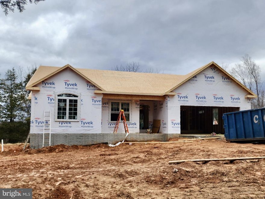 UNDER CONSTRUCTION - CHARLESTON II MODEL - LOT 1 -Estimated completion about 4 months.. Located on a lovely 4. acre lot. Home will include an open floor plan with stainless steel appliances and granite counter tops in kitchen, primary bathroom with double vanity sinks and walk-in shower; Covered front porch out front, unfinished basement with bathroom rough-in for future expansion and a 2 car garage. Upgrades are available and not included in the list price. Still time to make selections! Call for more information today!