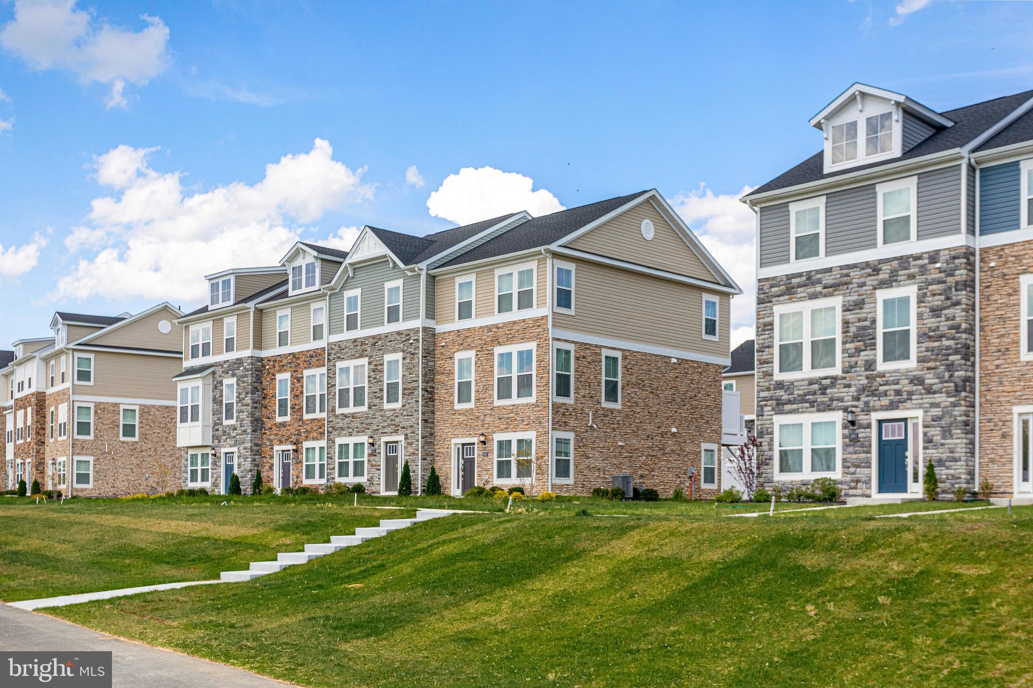 Discover a brighter way of living at Highlands Evolv Residential in St. Charles, Maryland. Here, the luxury of townhome living blends seamlessly with the flexibility of renting, all within a community designed with your lifestyle in mind. Each of our two car garage townhomes offer a taste of refined living and provides access to a broad range of amenities within the St. Charles master planned community as well as a selection of excellent schools. Photos are of decorated Leasing Office at 5691 Glencoe Place. Hours Tuesday - Sunday 11:30 -5:30.