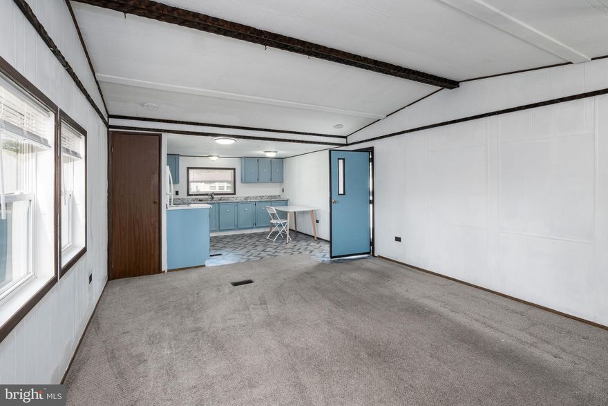 Great home!  Ready to move in!   Access to the Beach, and plenty of entertaining room.  Great if you have a boat, or just the peace and serenity that this home provides- just bring your beach chairs.

Move right in!  This delightful home offers a warm and inviting atmosphere perfect for creating memories. With three spacious bedrooms and one and a half bathrooms, this home features a traditional floor plan that seamlessly combines comfort and functionality. The cozy eat-in kitchen is equipped with essential appliances, including a brand new, never used stainless steel microwave, refrigerator, and electric oven/range, making meal prep a breeze. Enjoy the convenience of main floor laundry washer and dryer, and the added comfort of window treatments throughout. Step outside to discover your own slice of paradise! The property boasts a generous lot with a private beach just a short stroll away, perfect for relaxing days by the water. The outdoor space features a deck, ideal for entertaining or enjoying peaceful evenings surrounded by nature. With views of lush gardens, trees, and the serene street, this home offers a tranquil escape from the hustle and bustle. Located in a friendly community with easy access to public transportation, this property is not just a home; it's a lifestyle. With ample parking available on the driveway, you’ll have plenty of space for guests. Embrace the beauty of Bay City and make this inviting home yours today!