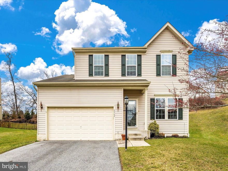 This beautiful colonial thoughtfully situated at the end of a quiet cul-de-sac in the sought after Oak Creek subdivision is  ready for you to call "Home"! As you step into the foyer, you'll immediately notice the original owners have kept this home in exceptional condition and have spared no expense in upgrades along the way. Off to the right of the foyer is an inviting formal living room with beautiful hardwood flooring, custom paint, and custom window treatments. Down the hall, you'll love the openness of the floor plan with the large chef's kitchen in the heart of the home. The kitchen features stainless steel appliances, recessed lighting, a large peninsula with seating for informal dining, an HGTV worthy custom pantry creating an aesthetically pleasing space to store all of your kitchen area needs. The kitchen opens up to a large family room with a gas fireplace and custom lighting as well as a large, light filled morning room outfitted with custom valences and shades. From the morning room, you'll step onto the large custom patio with a beautiful retaining wall, perfect for entertaining, grilling, dining, and playing cornhole out back. As you enter upstairs to the bedroom level, you'll see a loft area off to the right which can easily be converted to a 4th bedroom, two generously sized secondary bedrooms and a hall bath. At the end of the hall you'll find the large primary suite featuring a walk in closet and a primary bath with upgraded tiling, double bowl vanity and a linen closet. The lower level is a dream "cave" featuring a custom bar, custom lighting, a custom snack bar/kitchenette, and half bath to create the ultimate space for entertaining guests or epic movie nights in. The owners have updated the electrical in the garage to add an additional 20 amps for all of your power tool needs, as well as additional shelving in the garage, upgraded main level laundry room, Newer AC unit (2019), custom paint and blinds throughout entire home, & new flooring on the upper and lower levels. Nearby shopping centers offer endless dining options, as well as nearby Starbucks, Walmart, Safeway,  Aldi, Michaels, Petco & More!