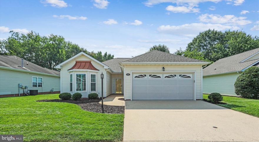 Welcome to Park West, a vibrant 55+ community designed for relaxed one level living in northwest Henrico County. Enjoy an active lifestyle with access to a Social Center that offers residents a wide variety of activities (water aerobics, Mahjong, book club, poker, happy hour), outdoor pool, fitness room, library and community activities. This lovely 2 bedroom/2 bath home with over 1400 square feet of living space is an ideal retreat  for those seeking space, comfort and privacy. The lot is wonderful  with tranquil views of treed common area from the primary bedroom, family room and  sunroom which  extends the living space to the outdoors with its dramatic light filled windows and access to the  rear patio. The interior is open and inviting with gorgeous hardwood floors and plantation shutters throughout.  The kitchen features  a breakfast area and opens to the dining room and family room with gas fireplace. The spacious primary bedroom suite features light filled windows, a walk-in closet and en-suite bath. An additional bedroom and full bathroom offer comfort and convenience for guests. Recent updates: HVAC (2021), Disposer (2025),  18 Vinyl Windows with  1" insulated triple strength glass, low e/argon gas glass package with screens (2025),  Sunroom Entry Door (2025).