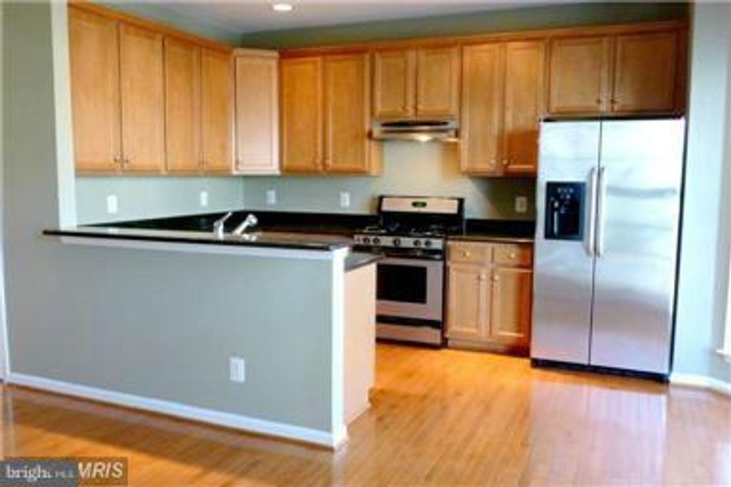 Photo of 5032 Greenhouse Terrace, CENTREVILLE, VA 20120 (MLS # VAFX2269786)