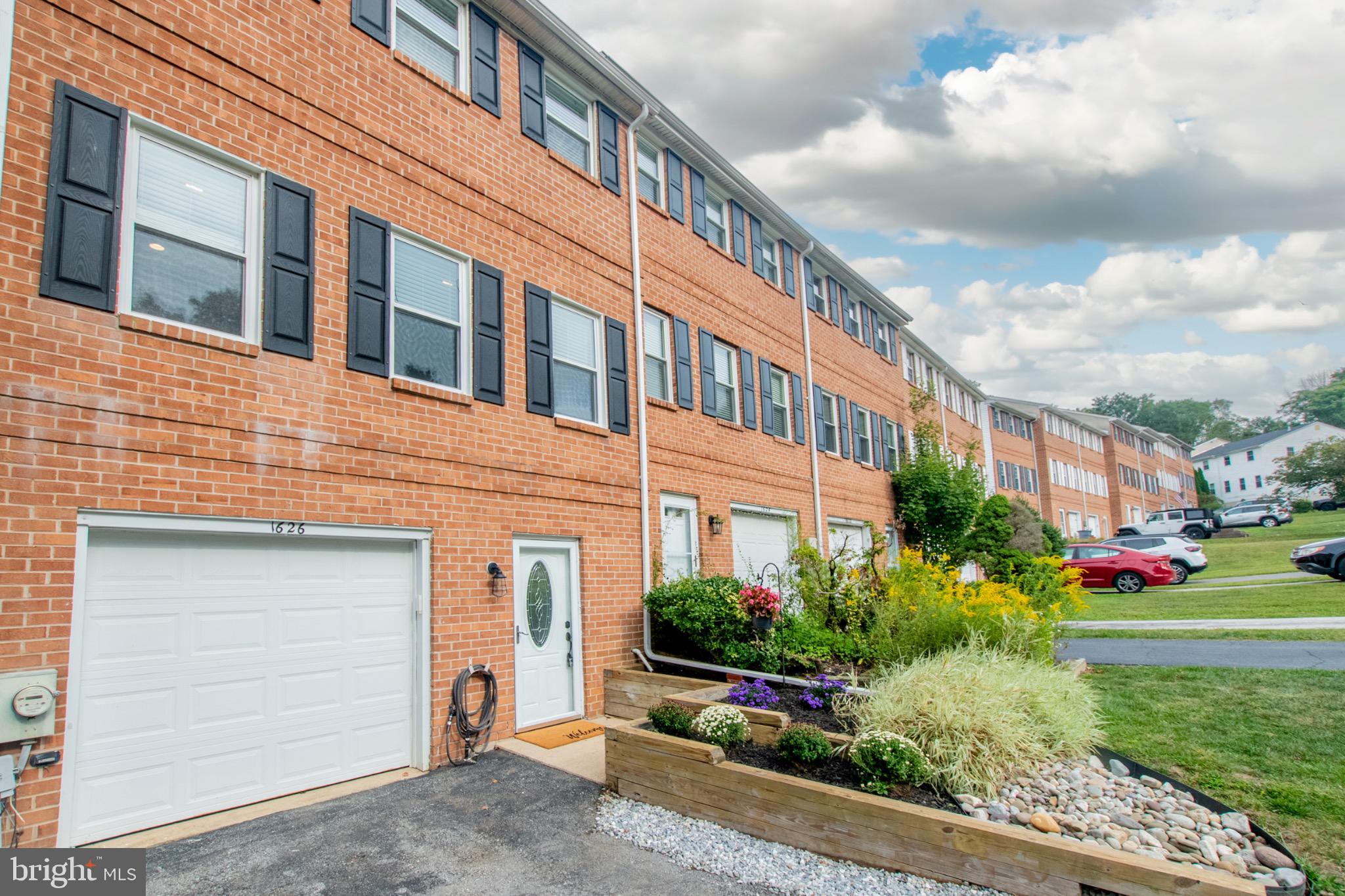 Discover the charm of Coventry Village, a sought-after community where convenience meets comfort. Just minutes from the boutiques, restaurants, and vibrant energy of West Chester Borough—and with easy access to Route 202 and Route 3—this three-bedroom, two-and-a-half-bath townhome offers the perfect balance of location and lifestyle.
Step inside to find a bright and inviting layout designed for both everyday living and effortless entertaining. The open kitchen and dining area flows beautifully into the family room, while the finished lower level, complete with an upgraded A/V receiver system (2024), sets the stage for movie nights or game day gatherings. Thoughtful updates throughout the home include two new sets of Andersen sliding doors (2024), leading to freshly refurbished decks (2025), plush new carpet (2024), custom blinds (2024), and tastefully renewed bathrooms (2020 and 2024). A reimagined laundry area (2023) with new washer and dryer (2023), plus a new dishwasher (2024), oven (2025), refrigerator (2024) and water heater (2022), add peace of mind and modern comfort.
Outside, enjoy your morning coffee or evening unwind on either of the two decks overlooking the fenced yard. A one-car garage, low property taxes, and a modest HOA fee make ownership both practical and affordable. With West Chester’s award-winning schools and a one-year home warranty included, this move-in ready townhome is more than just a smart choice—it’s a place to truly call home.