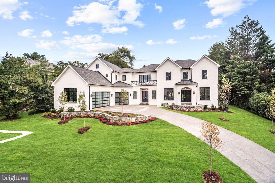 New transitional design by Brush Arbor Homes. Designer finishes throughout. Truly fantastic lot in one of the prettiest parts of Salona Village. Approximately 7,700 finished SF! Main lvl 11-ft ceilings, rustic white oak flrs, porch with motorized screens, 5BR up, incl private in-law/nanny suite w/bar. Optional elevator. Lower Level with walk up access to the rear yard, custom bar, etc.