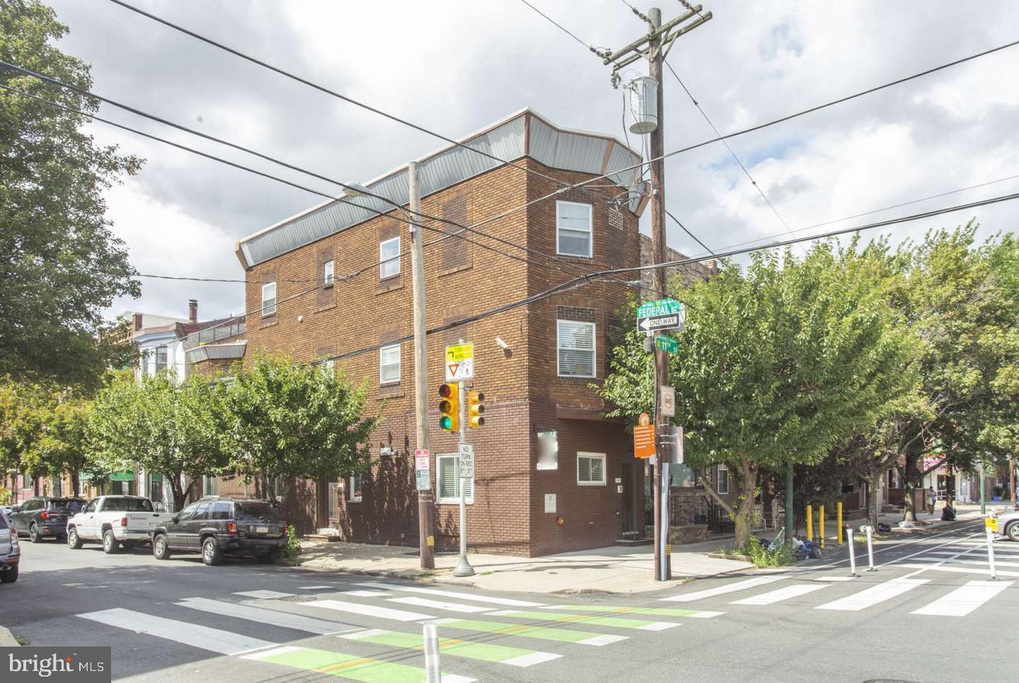 Seller and Listing Broker have an active listing agreement in place. Please do not call Seller directly. Invest in your future in this cash-flowing triplex in the popular Italian Market neighborhood of Philadelphia. The owners are ready to retire and pass on their success to you. Make your first investment an “easy win". The building was renovated recently, so you won’t have to worry about making changes after you buy. Additionally, there’s potential to increase your earnings by renting out extra storage space in the basement to tenants or a local individual who needs additional storage (or use it for yourself!). Each unit pays for its own gas and electricity (separate utilities & mechanicals- yea!). The landlord only pays for water for the two buildings and the common electricity. The building is equipped with the required fire alarm system, has legal triplex zoning, and holds active rental licenses and Lead-Safe Certificates from the city. Gross rent is $6100/mo for two 2-bed/2 bath flats and one 1-bed/1 bath flat starting on 7/1/2025 (that's up $400/mo from the current rents). The third floor has a private roof deck, and all units have central air and in-unit laundry. The opportunity here is perfect for the savvy investor!