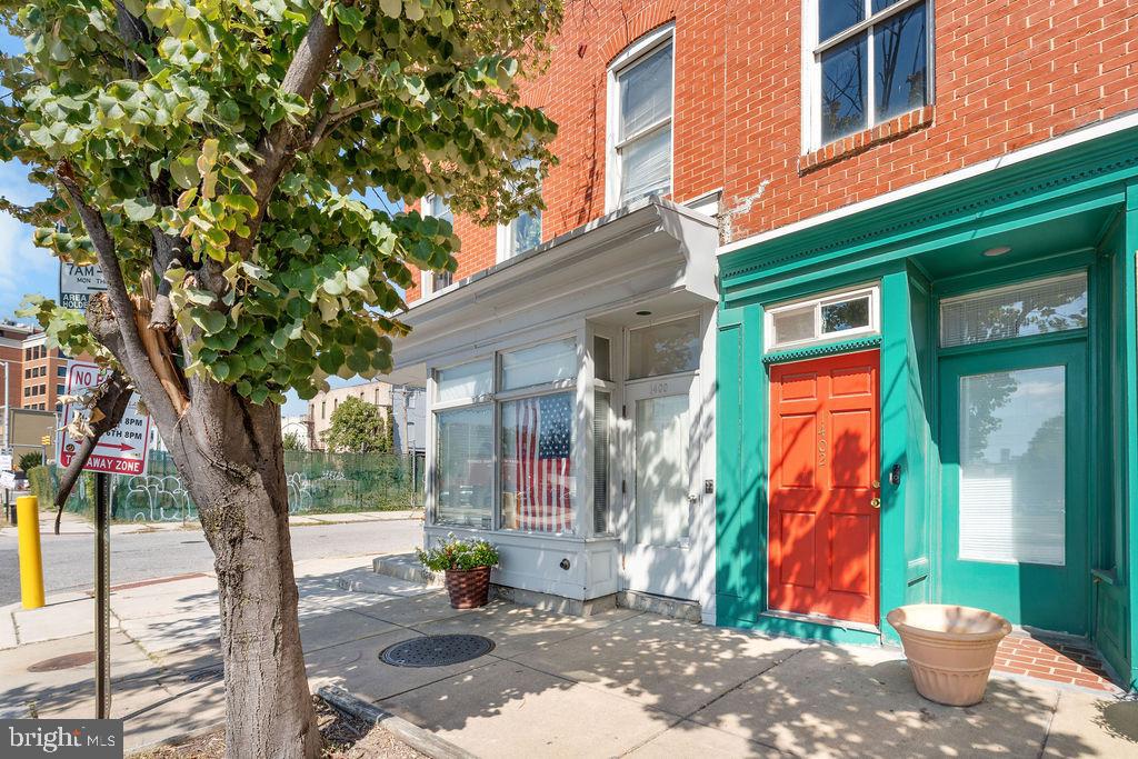 Live in the heart of Baltimore's historic and vibrant downtown district! This updated 2-bedroom, 1.5-bathroom condo at 1402 E Baltimore Street offers style, convenience, and unbeatable access to some of the city's most desirable neighborhoods. Features include: Spacious open-concept living area with hardwood floors throughout, modern kitchen with stainless steel appliances, dishwasher, garbage disposal & ample cabinetry. Large bedrooms with walk-in closets and abundant natural light, beautifully tiled full bathroom + convenient half bath. In-unit laundry. Secure building access. The property includes 2 assigned off-street parking spaces (a rare find in downtown Baltimore!) Enjoy easy access to: Fells Point, Harbor East, and the Inner Harbor just minutes away Johns Hopkins Hospital ideal for professionals, students, or medical staff. Steps from shops, restaurants, cafes, and nightlife. Close to public transit and quick access to I-83