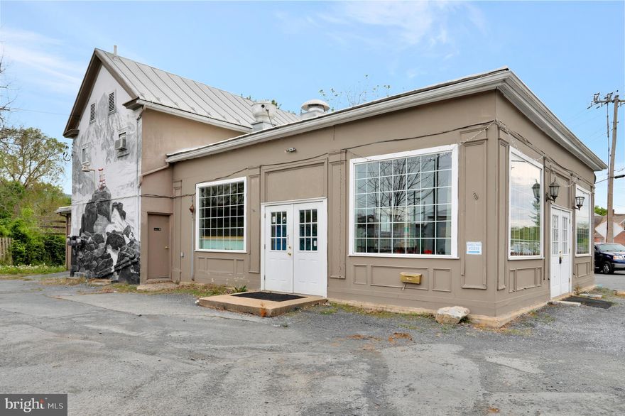 Commercial building in downtown Strasburg.  Great location at the intersection of Rt 11 & Rt 55.  Potential for two separate occupants on the main level plus an apartment upstairs.  The main level has recently been a restaurant and has a commercial kitchen with exhaust hood and gas lines.   In need of TLC, but the possibilities are endless!  Call now to schedule a tour and make this place your own!