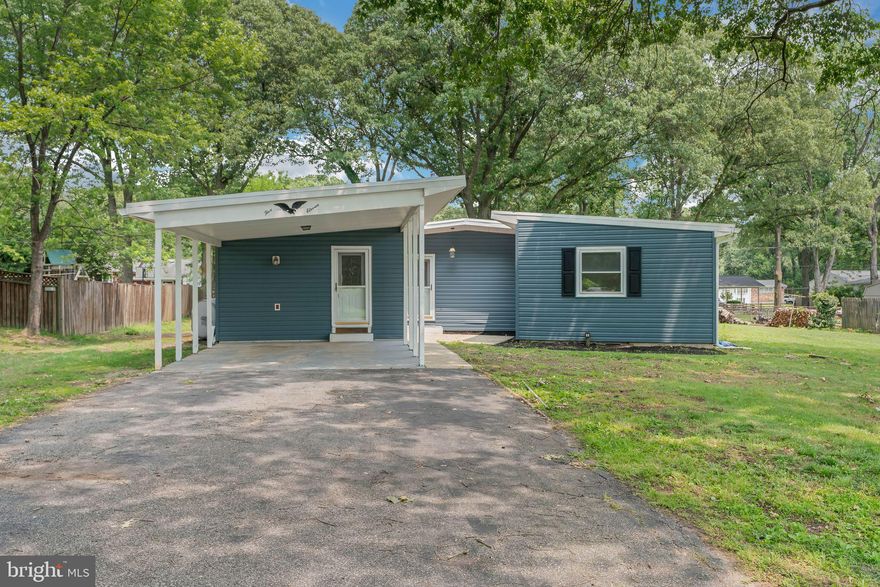 Seller just finished a beautiful basement renovation (MUST SEE)—home is back on the market and ready to show! 
MOTIVATED SELLER! Submit your best offer now, seller is reviewing ALL offers!
Home may be purchased with  an assumable 2.75% interest rate VA loan. Ask for details" - Welcome to your dream home in a water-privileged community! This beautifully updated residence boasts a fully renovated kitchen, flowing into an open-concept dining and living space, ideal for entertaining. The main level offers 3 spacious bedrooms and 2 updated bathrooms, complemented by new interior renovations, new roof, new HVAC, and new siding!

The fully renovated basement offers a rec room, bedroom and full bathroom.  Enjoy a long driveway, large backyard, and breathtaking views of the Magothy River just down the street.

Located in a water-privileged community with access to a private beach, pier, playground, and picnic area, and ideally situated near major routes to Annapolis, Baltimore, Fort Meade, and D.C.