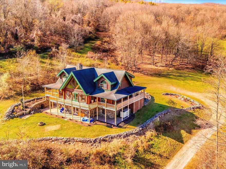 Expansive Retreat nestled in the heart of the scenic Allegheny Mountains, this serene property offers the perfect blend of peace, privacy, and natural beauty. This charming residence is an ideal retreat for those seeking to escape the hustle and bustle of city life.  This property sets on  three (3 ) parcels equaling  145 +/- acres, this exquisite home boasts inviting features an open floor plan with 3 story stone fireplaces, spacious living areas, large windows that bathe the rooms in natural light, and an exterior that blends seamlessly with the surrounding landscape. Whether you're looking for a year-round home or a weekend getaway, this property offers the perfect space to unwind and enjoy nature. Enjoy easy access to local outdoor activities, including hiking, fishing, and wildlife viewing in the nearby state parks and national forests. Plus, with just a short drive to nearby towns, you can easily access essential amenities while still enjoying the tranquility of country living. Don't miss your chance to own this picturesque property and a slice of mountain paradise.