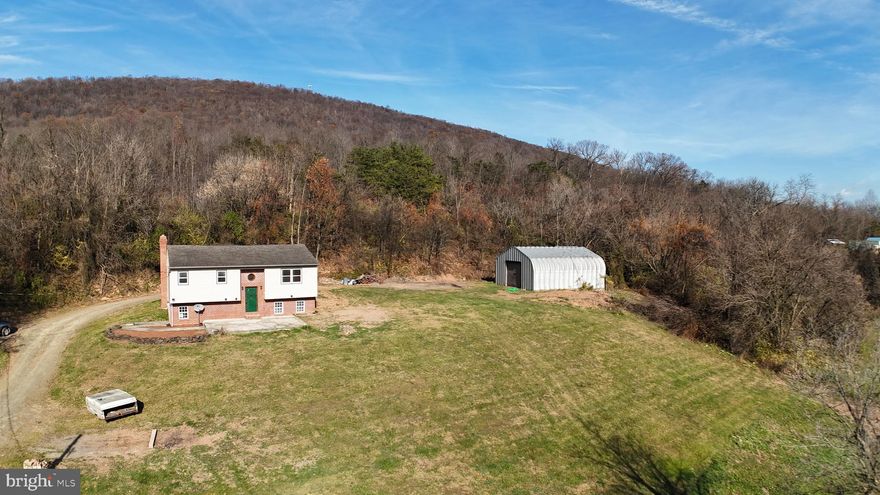 **Offer Received and offer deadline set for Saturday, April 19th at 2PM** Endless Possibilities Await at This Unique 1,839 Sq. Ft. Bi-Level Property! Set on 4.5 picturesque acres, this versatile 3-bedroom, 2.5-bath home offers the perfect blend of residential comfort and commercial potential. Zoned for commercial use, it’s an ideal setup for living where you work—or creating a multi-functional space with room for in-law quarters in the walkout basement. Enjoy excellent visibility with prime frontage along Rt. 322/22 and West Shortcut Road, just minutes from Newport Plaza and the Rt. 322/Rt. 34 interchange. A private well and septic system serve the property, and there’s plenty of space for animals, gardens, or even a small hobby farm. The 30x40 metal shed with concrete flooring is ready for storage, workshops, or business use. Surrounded by nature and abundant wildlife, this peaceful, secluded setting offers the best of both worlds—convenient access and quiet country living. Whether you're an entrepreneur, homesteader, or investor, this is a one-of-a-kind opportunity to own a truly flexible piece of real estate.