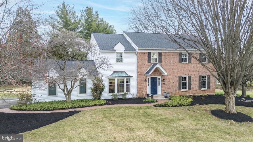 Welcome Home! This move-in ready, open-concept, 5-bedroom, 2.5-bath home is ideally situated at the entrance of a cul-de-sac and offers a large private backyard and two-car garage. The home includes over $120,000 in improvements to include a new roof, siding. kitchen, half bath, furnace, hot water heater, sewer line, and access to North Penn school district. The bright two-story foyer welcomes you with gleaming hardwood floors and abundant natural light. The fully renovated kitchen is a standout feature, showcasing granite countertops, under counter lights, slow-close Yorktowne cabinetry, a 5-burner natural gas stove, stainless steel exhaust hood, built-in microwave, subway tile backsplash, oversized sink, center island with seating and stylish pendant lighting.  The formal living and dining rooms provide elegant entertaining space, with the dining room featuring a bay window and classic wainscoting. The spacious family room offers recessed lighting, a wood-burning fireplace, custom built-in bookshelves, and access to the expansive brick patio overlooking the backyard. A renovated powder room, coat closet and laundry / mud room with exit door complete the first floor.
Upstairs, the primary bedroom suite includes a beautiful bathroom with marble-topped double vanity, elegant tilework, custom wood detailing, walk-in closet with custom shelving. All bedrooms offer generous closet space. A guest bathroom with dual vanity, tub shower combination, hallway linen closet, ceiling fans, whole house fan, and pulldown stairs to an attic complete the second floor. 
The partially finished lower level adds even more living space with a newly renovated recreation room, tall ceilings, extra storage, a workshop or craft area, and an exterior exit door.  Outside, the level backyard is perfect for sports, barbecues, and relaxing outdoors. Convenient access to scenic trails of Gwynedd Preserve, major roadways, SEPTA Regional Rail, shopping, dining, and local parks and recreation. Close to Routes 202, 309, 63, and the PA Turnpike for easy commuting. Hurry and schedule your showing today!