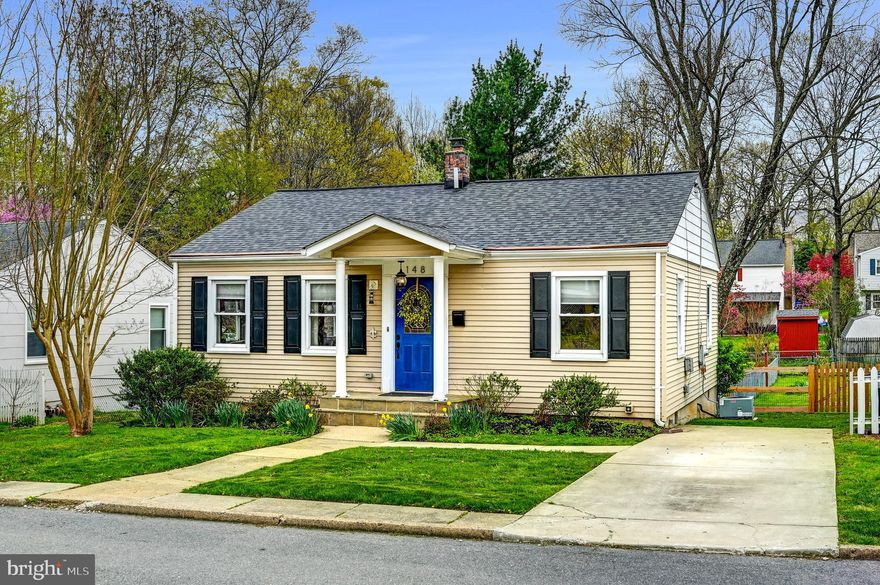 Pretty as a Picture and Move-In Ready in the Heart of Catonsville!
This beautifully updated two bedroom, two bath home blends timeless charm with modern comfort. From the welcoming covered front porch to the warm hardwood floors found throughout most of the home, every detail invites you to settle in and relax.  The heart of the home is the thoughtfully designed kitchen, featuring granite countertops, gas cooking, and an open layout that flows seamlessly into the spacious living room. Just off the kitchen, step into a large screened-in porch; ideal for morning coffee, quiet evenings, or entertaining guests. Two generously sized bedrooms and two stylishly updated baths complete the main level.
Outside, enjoy a private, fully fenced backyard with a lovely patio, perfect for gardening, play, or unwinding in your own outdoor retreat. The unfinished basement provides excellent storage and works well as a home gym, while the private parking pad adds everyday convenience.  Nestled on a quiet street and easy access to Catonsville’s charming shops and restaurants, this home also offers easy access for commuting. A perfect blend of comfort, style, and location—this one has it all!
