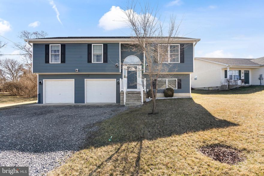 Welcome to 448 Orchard Ave, Martinsburg, WV – a charming, 3-bedroom, 2.5-bathroom split foyer home, perfect for modern living! The CARE that has gone into this home is incredible! 

Step inside to find freshly painted interiors with elegant crown molding upstairs, adding a touch of sophistication. The kitchen shines with brand-new granite countertops, perfect for meal prep and entertaining.

The mostly finished WVU-themed basement is a dream for Mountaineer fans! Whether you're watching the big game or hosting friends, this decked-out space brings the ultimate West Virginia University spirit right into your home. This could also be used as another bedroom suite! 

Enjoy outdoor living on the 1-year-old Trex deck, overlooking the backyard – an ideal spot for relaxing or hosting gatherings. Conveniently located just minutes from Rt. 9, this home offers easy access to shopping, dining, and commuting routes.

Don't miss out on this move-in-ready gem! Schedule your showing today.
