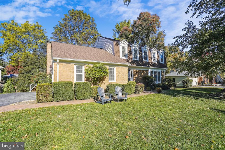 First time being offered for sale since 1986! This brick colonial was built in 1977 and sits on a corner acre lot that’s 15,253 sq ft (.35 acre) on a quiet cul-de-sac. You’re welcomed into the foyer which features hardwood flooring, a coat closet and powder room. To the right is a large living room with bay window which flows into a formal dining room. In the early 2000s, an addition was built off of the dining room with a large vaulted ceiling bonus room with skylights, recessed lights, and a wall unit for heating an cooling. This could be a perfect office, playroom, or multi-purpose room as your needs require. The foyer also has direct access into the eat-in kitchen which features 2 stainless steel wall ovens, an electric cooktop, refrigerator, dishwasher, microwave, and pantry. There’s a large bonus butler pantry that connects the dining room and the kitchen, and the large laundry room is off the kitchen as well with cabinets for extra storage. Off of the kitchen is a family room with wood burning fireplace, sliding glass door to the large 2 level deck, and access to the 2 car garage. The deck features Trex flooring and stairs to the flat yard. The garage fits 2 cars and has built in storage racks. Upstairs you’ll find a large primary suite with a newly renovated bathroom (completed earlier in 2023). The bathroom features a large vanity, a walk-in shower, 1 walk in closet and 1 reach in closet, and bonus vanity top. There are 3 secondary bedrooms that share a large hallway linen closet and large bathroom with dual sinks and a shower/tub combo. There are hardwood floors throughout the main and upper levels. The lower level is a walk-out with a sliding glass door to the yard. The rec room features recessed lighting and new carpeting. The 5th bedroom and 3rd full bath are located in the basement. There’s also a storage/utility room. The yard features a large storage shed. Updates includes: new paint throughout, refinished hardwood floors, new kitchen hardware, primary bathroom, deck boards/rails (2023), HVAC (2022), water heater (2016), exact date unknown but recently replaced roof and windows. Westbriar ES, Kilmer MS, Marshall HS.  The location is ideal for easy access to Spring Hill Metro (1m and accessible by foot - see map) and Tysons/Dulles Toll Road/Beltway.