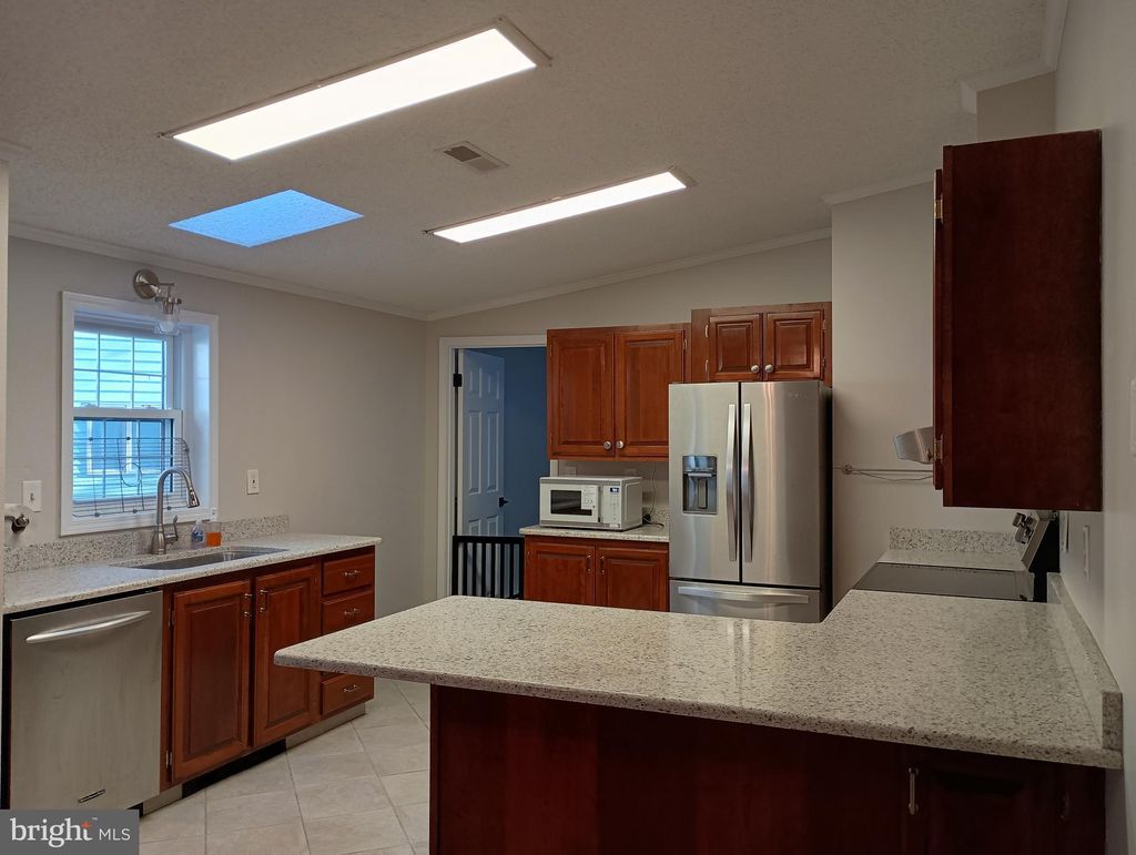 Photo of 32217 Sandpiper Drive, LEWES, DE 19958 (MLS # DESU2101382)