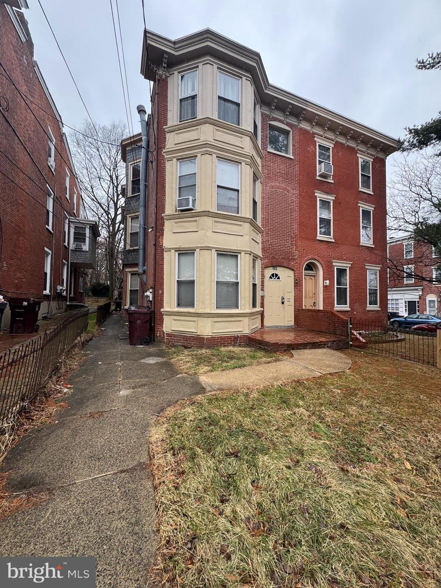 Charming Investment Opportunity in Historic Trinity Vicinity

Presenting a rare and timeless multi-family property with classic brick architecture on a peaceful, tree-lined street in the highly desirable Trinity Vicinity of Wilmington, DE. This brick triplex, originally built in 1875, offers a strong income-producing layout and exceptional location just minutes from downtown’s business district, shops, restaurants at Trolley Square, parks, entertainment options, and convenient I-95 access — ideal for both residents and commuters.

Each of the three spacious units features 2 bedrooms and 2 full baths, thoughtfully designed with generous layouts and classic period details.  Walk through living spaces, while eat-in kitchens open to outdoor decks or yard areas — perfect for outdoor enjoyment and tenant appeal. Decorative radiators, extra-wide baseboards, bumped-out windows, arched doorways and exposed brick walls offer timeless character that sets this property apart. Each unit is tenant occupied on month to month lease at $1400