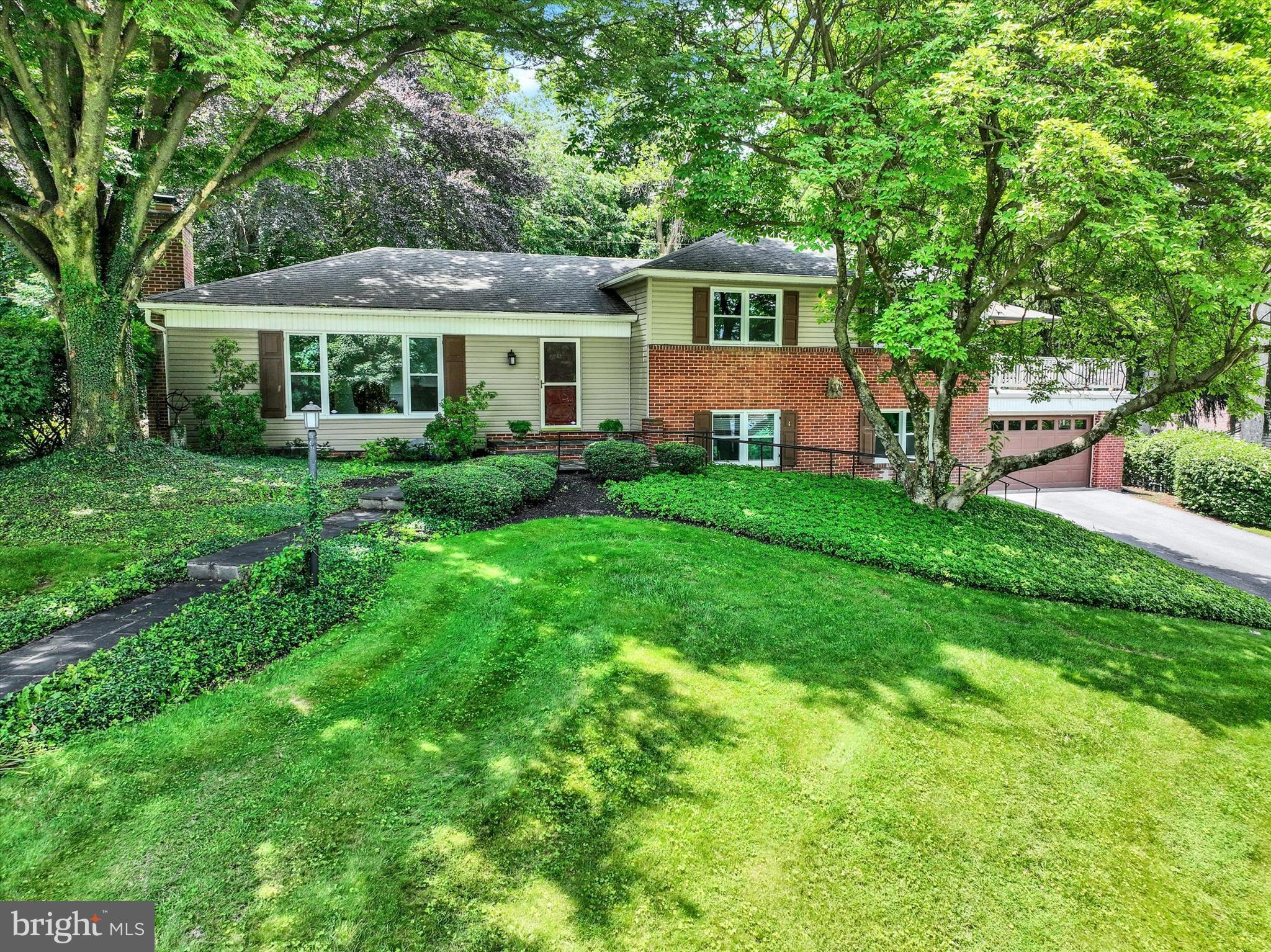 Escape the ordinary & discover the perfect blend of modern comfort & timeless elegance in this beautifully updated home in desirable Farquhar Estates backing onto Reservior Park in York Suburban Schools *As you step into the foyer a graceful curved wall draws you into the heart of the home *Gracious Living Room highlighted by gas fireplace & picture window *You'll love the seamless flow leading into the gorgeous updated kitchen with tile flooring, granite counters & breakfast bar plus custom serving area *Entertaining & family celebrations are elevated in the elegant Dining Room *This spacious residence offers 4-5 Bedrooms providing flexibility for family, guests & home office *Indulge in the spa-like Primary Bath highlighted by luxury Victoria Albert tub & 40x40 walk-in shower *Expansive Family Room offers something for everyone -whether its a game of pool, movie nights or relaxing by the cozy fireplace *Outdoor entertaining is elevated with multiple spaces to gather & relax...take in views of the city from the elevated deck, ready to support your hot tub, gather around the firepit on the patio beneath the canopy of trees or explore nature just beyond your fenced yard down the path leading to Reservoir Park *New roof, windows,3 zone boiler & CAC in past 10 years *Don't miss your opportunity to own this one of a kind home!