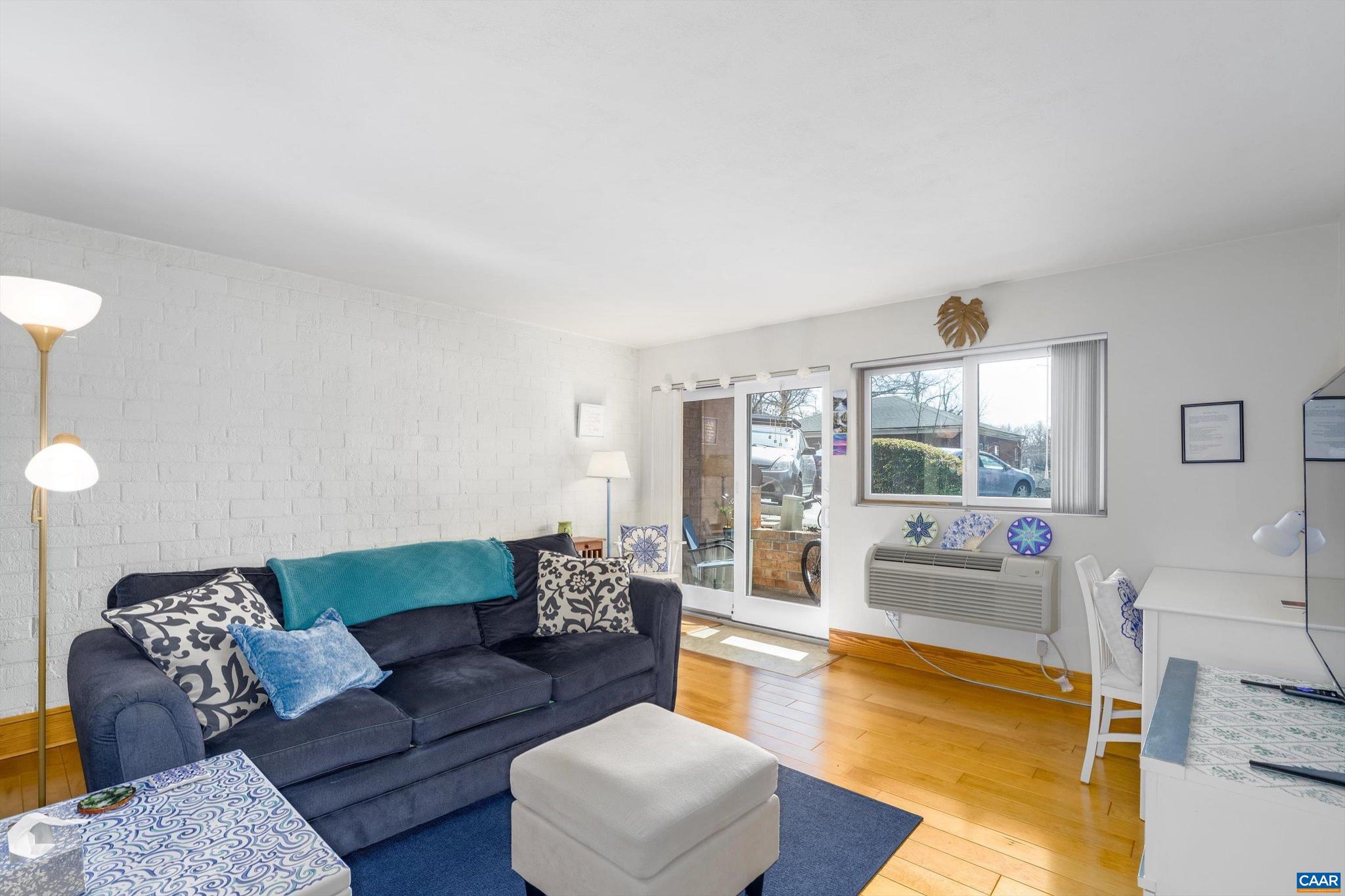 This unit hits ALL the marks: clean, updated, comfortable 1 BR, 1 Bath, garden-level condo includes hardwood flooring in the living room, carpeted bedroom, and in-unit washer/dryer. Redesigned cabinets offer great storage. Within WALKING DISTANCE of UVA Hospital and grounds (also on bus line) to give you access to endless shopping, restaurants, and cultural amenities, while offering comforting shelter so that you can rest, replenish, and return to conquer the world.