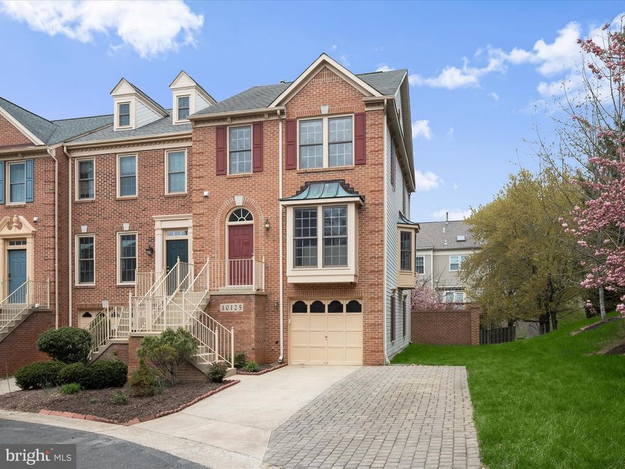 Welcome to this end-unit, brick-front garage townhome perfectly position within the acclaimed Wootton School District and just moments from premier shopping, dining, and recreation! This home blends space, style, and convenience into one impressive package.
Step inside to over 2,200 square feet of beautifully refreshed living space spread across three levels. The entire interior has been freshly painted and features brand-new carpeting, creating a move-in-ready experience from the start. Hardwood flooring flows throughout the main level, where natural light pours into the bright and spacious living room. The adjoining dining room, enhanced by elegant an bump-out window, offers the perfect setting for entertaining or casual meals.
The kitchen boasts granite countertops, stainless steel appliances, and a cozy breakfast area. An atrium doors leads directly to the sizable deck—ideal for outdoor dining or unwinding on sunny afternoons.
Upstairs, the primary bedroom feels like a private retreat with its vaulted ceiling, generous walk-in closet, and beautifully renovated en-suite bath. The spa-like bathroom features a large tiled shower with a glass door and river rock-style flooring. Two additional bedrooms and a full hall bath complete the upper level.
The lower level offers even more flexibility with a comfortable family room, warm fireplace, and direct access to the backyard. A full bath and interior entry to the one-car garage enhance both function and ease of living. Out back, enjoy a fenced yard complete with privacy fencing and brick for a courtyard feel—ideal for relaxing, entertaining, or simply enjoying a quiet moment outdoors. For convenience and functionality, the home offers an expanded concrete and paver driveway that is wider than most.
The location is just as impressive. Enjoy the proximity to Trader Joe’s, Crown and Rio shopping centers, Travilah Square Shopping Center, Travilah Village Center, North Potomac Community Recreation Center, and esteemed campuses like the University of Maryland and Johns Hopkins Shady Grove. Commuting is a breeze with nearby Rockville and Shady Grove Metro stations. Outdoor enthusiasts will love RedGate Park’s 131 acres of green space and trails, as well as the scenic Bethesda Trolley Trail.
This townhome offers comfort, location, and thoughtful updates throughout—don’t miss your opportunity to make it yours.