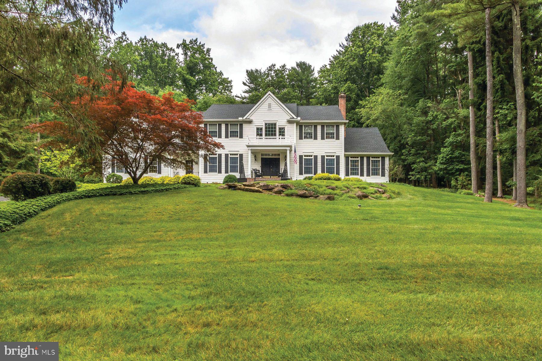 Nearly 2 ½ acres in the upscale enclave of Bellinghamshire Estates. This professionally decorated home is situated on a beautifully manicured lot where privacy is premium. This exceptional bright and open home has all the amenities and features that a buyer would expect in today’s environment of high standards. There is a new eat in gourmet kitchen with premium appliances and butler’s pantry. The home also features beautiful maple wood flooring throughout the main level, architectural and decorative lighting throughout the home, a library with custom built-in bookshelves, a family room with 2 story stone fireplaces, and a Conservatory with tray ceilings. The upper level offers a beautiful Master Suite with sitting area huge master bath and multiple walk- in closets. The lower level is finished and includes a large home office, fitness room, a home theater with surround sound and a full bath with jacuzzi steam shower. The exterior includes a large Timbertek Deck, exterior lighting, outdoor sound system and beautiful mature landscaped grounds. There is also an attached oversized 3 car heated garage. The home is perfectly located in the New Hope-Solebury School District, 70 minutes to NYC, 60 minutes to Philadelphia and 35 minutes to Princeton.