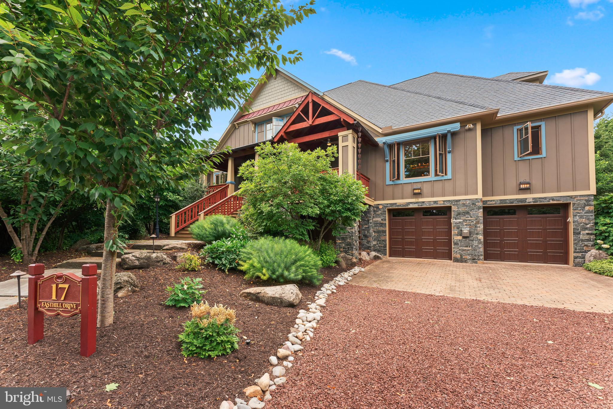 Welcome to a true sanctuary in the coveted Doylestown Borough, where elegance meets unparalleled privacy on an expansive half-acre lot. This exceptional modern Craftsman home stands as a testament to meticulous design and superior craftsmanship, nestled on a serene, non-through street. This private haven, complete with an awe-inspiring custom pool and breathtaking landscaping, offers a lifestyle of unrivaled sophistication.
As you approach, the grand mahogany front porch invites you to relax and savor the tranquility of this magnificent property. Step inside, where an open floor plan and abundant natural light create a welcoming ambiance with serene views from every window. The heart of the home, the Great Room, boasts a stunning gas fireplace with floor-to-ceiling artisan masonry, flanked by newly enlarged windows that bathe the space in light and offer scenic vistas.
The gourmet kitchen is a culinary dream, featuring a spacious island, ample cabinetry, a double oven, and a walk-in pantry, seamlessly connecting to the dining area. This harmonious space is perfect for entertaining, offering views of the beautifully landscaped front and back yards. The main floor also includes a versatile bedroom and full bath, ideal for conversion into a primary suite or home office, along with a computer room, expansive mudroom, laundry room, and abundant storage.
Ascend the open staircase to the second floor, where a skylight illuminates the hallway leading to a light-filled primary bedroom with an exquisitely updated ensuite bath. Two additional bedrooms, adorned with architectural details, share a stylish full bath and offer generous closet space. The lower level features a cozy family room, an office or guest bedroom with an ensuite bath, and a second mudroom with direct access to the garage. A new whole-house generator ensures peace of mind.
Step outside to a meticulously landscaped paradise enveloped by mature trees and lush greenery. Relax on the exquisite stone patio or follow the walkway to the saltwater pool, a marvel of beauty and tranquility complete with swim jets and a spa, all controlled via a user-friendly app. The extraordinary hand-cut stonework surrounding the pool and patio adds a touch of timeless elegance.
Designed with sustainability and high performance in mind, this home features natural materials throughout, including bamboo floors on all three levels, and is equipped with a cutting-edge geothermal HVAC system. There is also space for an elevator, should you desire.
This home is more than just a residence—it's a private retreat within walking distance of the vibrant amenities Doylestown Borough has to offer, including renowned restaurants, charming shops, and cultural attractions. With its impeccable design, prime location, and luxurious features, this property represents the pinnacle of modern living in Doylestown.
Don't miss the opportunity to own this extraordinary home, where every detail has been thoughtfully crafted to offer the ultimate in comfort and sophistication. Your dream home awaits in Doylestown!