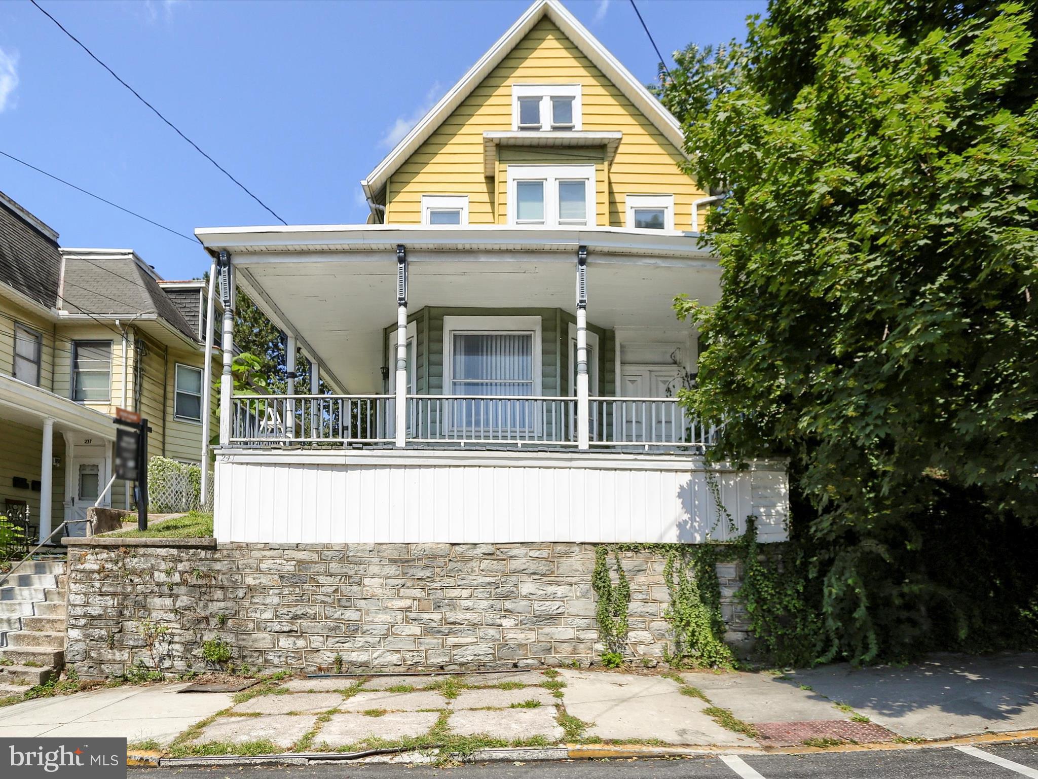 This Colonial-style residence, situated in the heart of Steelton Borough, presents an exceptional opportunity for discerning buyers seeking a blend of historic charm and modern convenience. Originally constructed in 1900 and renovated in 2019, this property boasts a total finished area of 2,629 square feet, offering ample space for various lifestyle needs. The interior features a formal dining room, ideal for hosting gatherings and entertaining guests, complemented by an eat-in kitchen. The property includes a full, unfinished basement, providing abundant storage options or the potential for future customization to suit personal preferences. The overall condition of the home is good, reflecting the quality of the renovations undertaken in 2019, which have modernized the space while preserving its historical integrity. The exterior is enhanced by a charming wrap-around porch, offering a serene space to relax and enjoy the neighborhood. The lot spans approximately 0.27 acres, providing a generous outdoor area for gardening, recreation, or future enhancements. Parking is available on the street, ensuring accessibility for residents and guests alike. The urban location of this property places it within close proximity to local amenities, including shopping, dining, and recreational facilities, catering to a variety of lifestyle preferences. This residence is not only a home but also a canvas for potential buyers to create their ideal living environment. With its blend of classic architecture, modern updates, and prime location, this property stands as a compelling choice for those seeking a unique and versatile living space in Steelton Borough.
