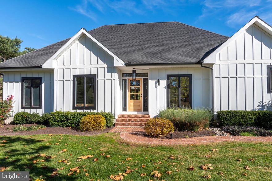 Simply Stunning! Fabulous Modern home on Oxford Road Corridor close to Talbot Country Club. Completely transformed in 2016 with a modern flair and a sophisticated vibe. Fabulous light filled  foyer leads to stunning   kitchen with abundant  custom cabinetry &  millwork, large custom wood topped island with seating for 10,   gorgeous marble counter, Viking and Fisher Paykel appliances, double refrigerator & wine fridge,  side bar, pantry, breakfast nook with contemporary  woodstove all lending itself to a great entertaining space. Integrated perfectly,  the spacious family room with 3 French doors showcases fabulous views of the elevated deck, patio,  inground saltwater pool and outdoor kitchen.  Luxurious first floor primary suite with walk in closets and fabulous spa primary bath. Additional bedroom with shiplap and custom tiled bath on first floor. First floor work space alcove in light filled 2 story space. First floor laundry and mud room with engineered hardwood floors throughout.  Second floor includes 2 spacious bedrooms with skylights, custom walls and full  bath with laundry. The 2 + acre property boasts extensive hardscape, custom outdoor lighting and great outdoor entertaining space. Back yard is completely fenced for additional privacy. This must been seen to be appreciated!  Please see virtual tour, professional photos coming this week.