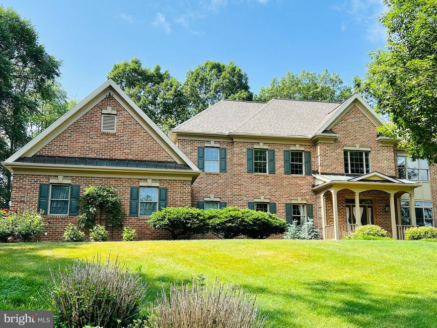 This stunning, architecturally designed home is perched on a gorgeous lot at the end of a quiet cul-de-sac in Hershey. Beautifully manicured long private driveway up to the house. Entry with vaulted ceilings and a wooden staircase. Formal dining room with hardwood floors, chair rail, and tray ceiling. The balcony overlooks the fantastic kitchen with new appliances, an oversized island, granite countertops, a built-in desk, and a cozy breakfast nook with views of the rear yard.  Adjacent living room with vaulted ceiling, fireplace, and large windows. Relaxing screened-in porch with ceiling fan. Private office with glass doors and built-in shelving. Complete, main level primary suite with high ceilings, walk-in closets, double vanity sinks, soaking tub, and standing shower.  Main-level laundry with sink and linen closet. Second staircase to upper-level loft, three additional bedrooms, and two full bathrooms. Large lower-level game room with built-in bar with a second kitchen with granite countertops and a full bathroom. Enjoy 4.56 acres of scenic views of foliage and wildlife from the wooden rear deck. Unique she-shed perfect for all gardening projects. Updated roof in 2023. Served by the acclaimed Lower Dauphin School District.