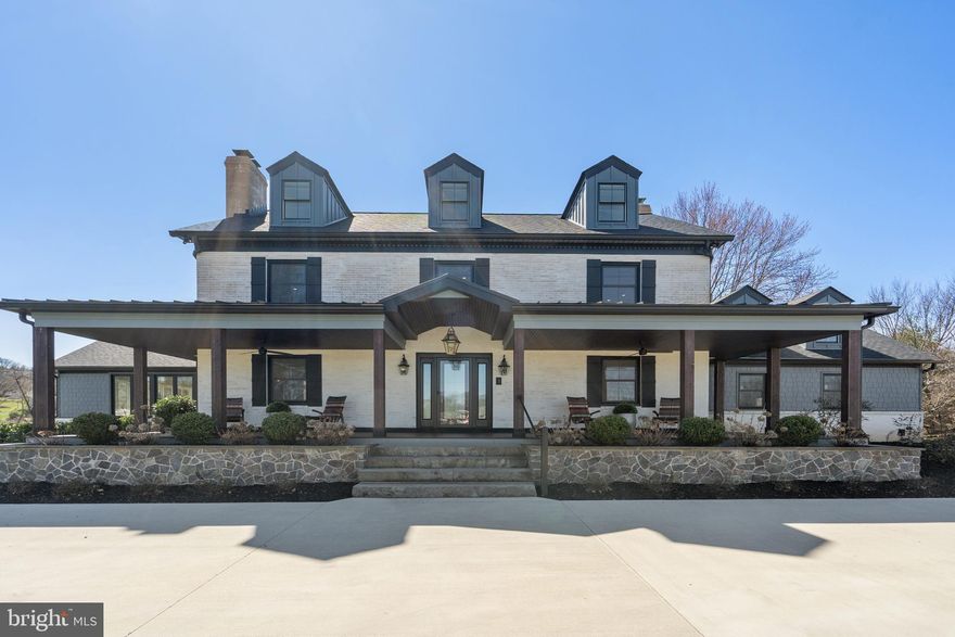 Welcome to this magnificent 4 bedroom, 5 bath custom home situated on over 4 acres! As you approach the property you are greeted by the beautiful stonework and mature landscaping that surrounds the expansive front porch. 

Inside you will find that the gourmet kitchen is a culinary masterpiece, boasting an oversized island, six-burner gas stove with a double oven, beverage drawers, a separate ice maker, stone fireplace and plenty of custom cabinetry by Tedd Wood. Entertain with ease in the generously sized dining room, flowing effortlessly into the light and bright family room with floor to ceiling windows. Don’t overlook the fabulous custom mudroom, complete with tiled dog shower and Dutch Door! 

Upstairs, the primary bedroom suite offers a lavish retreat with a spa-like en suite bath and access to the private third floor hideaway; a versatile space that can be used as a private dressing room, yoga studio, or home office. The possibilities are endless!  The second floor also features two additional generously sized bedrooms, a hall bath with double sinks and a convenient laundry room equipped with high-end LG appliances, including a dry-cleaning tower. 

The walkout basement boasts an additional bedroom, 2 full bathrooms, a wet bar, and an oversized rec room with a stone fireplace and plenty of space for entertaining.  Designed with impeccable taste and meticulous attention to detail, this home offers living at its finest, all while being just minutes away from parks, hiking trails, restaurants, and shopping.