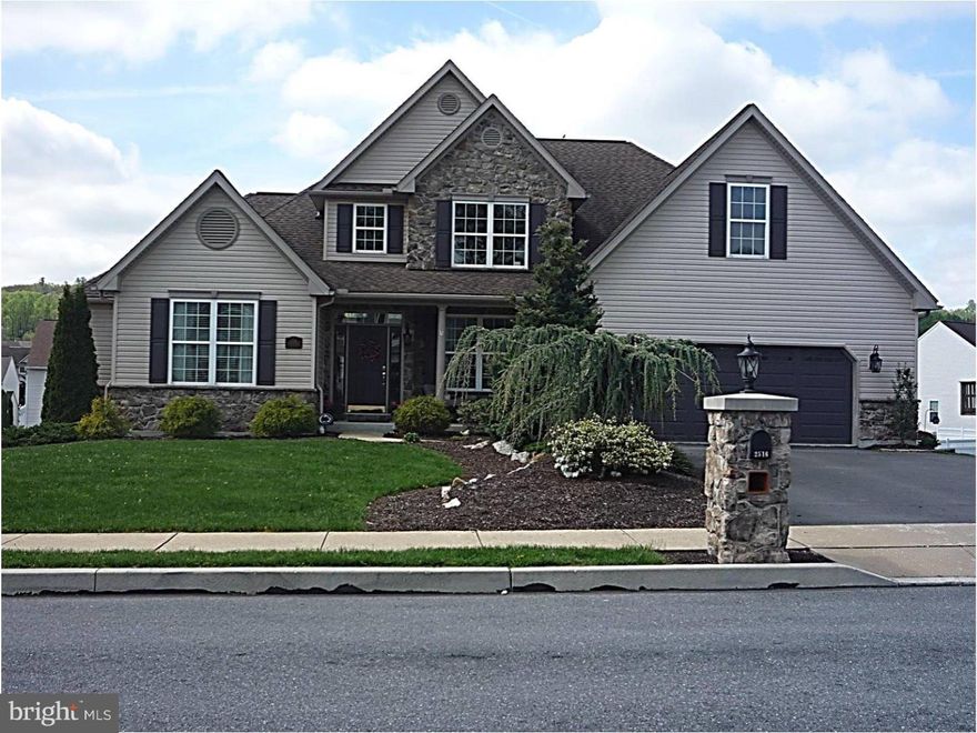 Get in before summer and enjoy the backyard oasis that this one of a kind home offers.  Located in the desirable Werner Farm development this home has numerous top of the line features that will make every day living enjoyable.  This home features a lower level master suite that leads out to a two story great room with a beautiful floor to ceiling stone fireplace surrounded by palladium windows.  The kitchen features custom cherry cabinets, a double wall oven, corian counter tops, a large island with breakfast bar and a beautiful gas cook top.  This house was built with serious entertaining in mind.  The main floor has a main level stereo system with built in speakers,  walk out of the kitchen to a  maintenance-free covered deck that also that leads down to a lower patio. Listen to your backyard waterfall while you sit by the firepit with your guests on summer nights.   The basement is one to behold it is fully finished and has a  full kitchen and full bathroom.  This space also boasts a projection TV with surround sound in the lower level family room  great for a home theater or could be converted into a in-law quarters.  The basement also has two doors that walk out to the fully enclosed backyard oasis.  Upstairs is three large bedrooms with a nice loft overlooking the great room as well as an additional hallway lighted specifically to display works of art.    This home is truly one of a kind.  Come see it today.