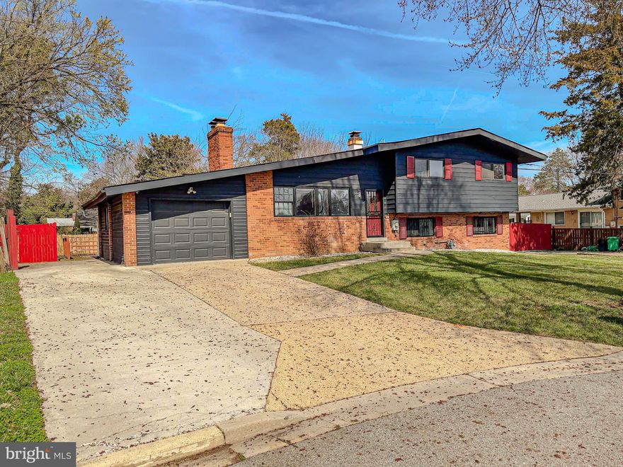 Welcome to 5504 Westminster Court, a spacious split-level home tucked away on a cul-de-sac in Temple Hills. This 4-bedroom, 3 full bath residence offers a functional layout with multiple living areas, hardwood flooring, and updated features throughout.

The main level features a light-filled living room, separate dining area, and a kitchen equipped with granite countertops, stainless steel appliances, and ample cabinetry. Just off the kitchen and dining area, an additional living space provides the option for a theater room, recreation area, or flex space, offering a natural extension for entertaining or everyday use.

The upper level includes well-sized bedrooms and updated bathrooms.

The lower level highlights additional living space with a large family room, fireplace, and a second full kitchen, providing flexibility for extended living arrangements, guest space, or potential separate living quarters. With its layout and features, the lower level offers added versatility for a variety of uses.

Additional features include new carpet, fresh paint, two fireplaces, a 1-car attached garage, and a side entrance. The exterior offers a deck and a fully fenced backyard.

Conveniently located with access to major commuter routes including I-495/I-95, Suitland Parkway, nearby Metro stations, shopping, dining, and local amenities.