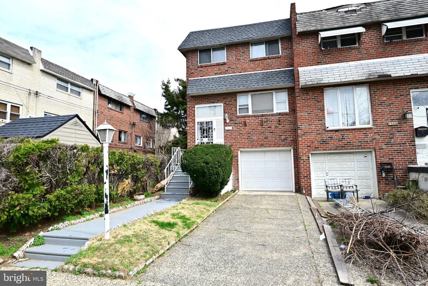 Location! Location! Location! Temple University is 7 minutes away. This very spacious lovely brick 2-bedroom row / townhouse has so much to offer. Enter the split-level foyer to an open concept first floor with a lovely fully equipped upgraded kitchen. White cabinets, stainless steel appliances, quarts countertops and plenty of natural lighting await a cook’s dream. The basement is full sized and finished with a half bath, laundry area, and has beautiful new Sliding patio doors to the spacious fenced in back yard. The upper level has two extra-large bedrooms and a spacious hallway to enter the beautiful, updated bathroom with an extra-large free-standing soak tub. There is private off-street parking and a garage for your car. Temple Sports Complex, Sullivan Progress Plaza, Fresh Grocer, Restaurants, Broad Street trains and buses and other services are all nearby. The location is ideal for Center City employees, access to I-676, Temple employees and students, and anyone looking for a beautiful home.  This property is priced to sell and inspections are welcome, however will be sold as-is.