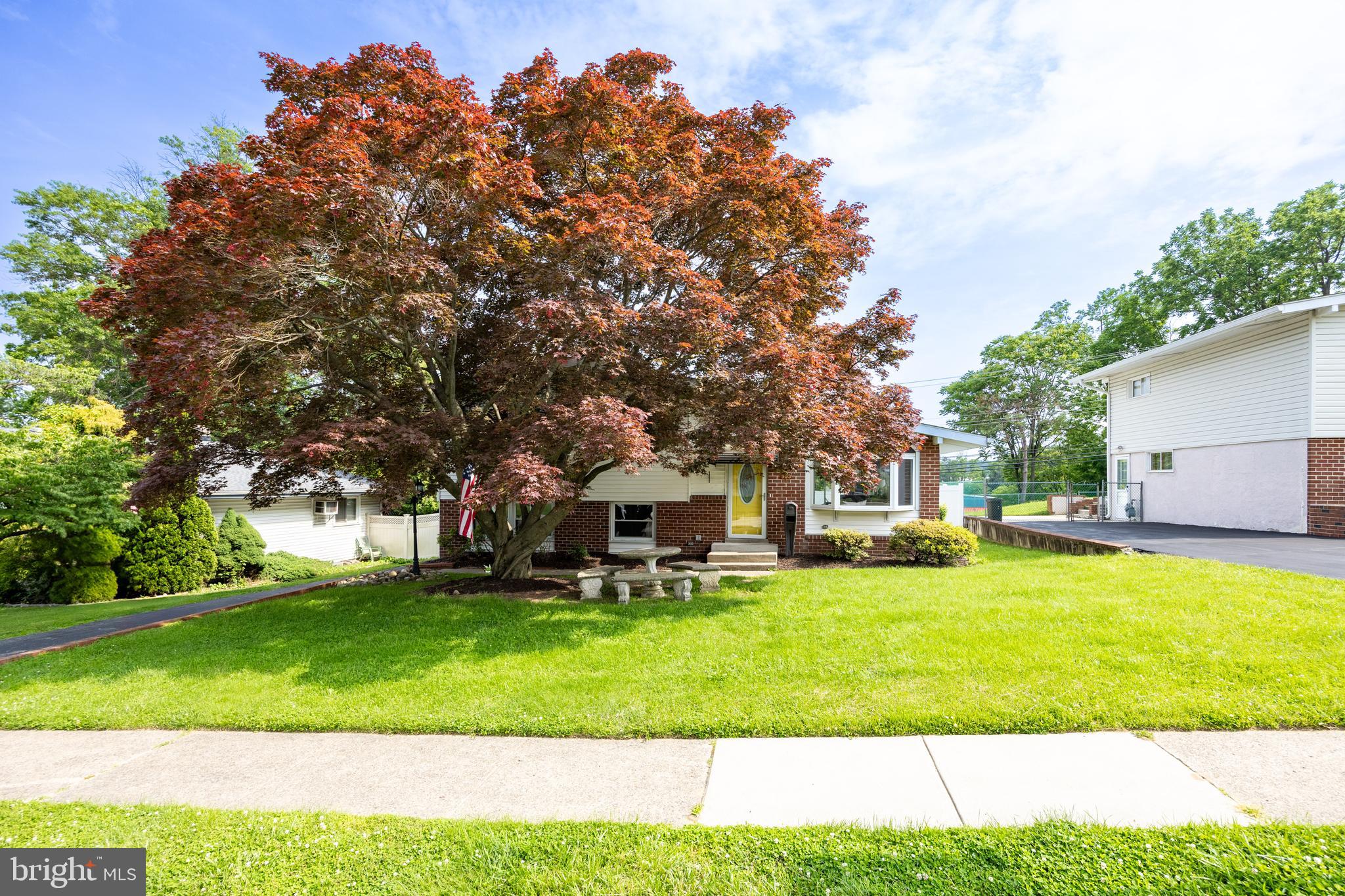 New Price Alert!!!Welcome to 533 Warren Blvd.! This beautiful 4 bed, 3.1 bath home in the desirable Lawrence Park community is calling your name! As you step into the main level, your eye is immediately drawn to the gorgeous Mahogany wood flooring that flows through the inviting living room and dining room. The spacious kitchen boasts abundant cabinet space, skylights, and a breakfast bar. Sliders off of the kitchen lead out to a new concrete patio (2023) and an expansive rear patio perfect for entertaining in the fully fenced backyard—ready to host your summer barbecues!
Also on the main level is a rare, large primary bedroom suite with a full en-suite bath, sitting area, plentiful closets, and attic access. If you're looking for an incredible main floor in-law suite, this is it! The second level offers another primary bedroom suite with brand new carpeting (2025) and an updated full en-suite bath (2023). Two more generous bedrooms and an updated full hall bath (2023) complete the second level.
More space abounds in the fully finished lower level with a large family room, half bath, laundry, and walk-out access. Other recent updates include brand new carpeting throughout (2025), a new HVAC system (2023) and new privacy fencing around the property (2023). With quick access to local shopping centers and the Blue Route, this home is sure to please! Schedule your tour ASAP!