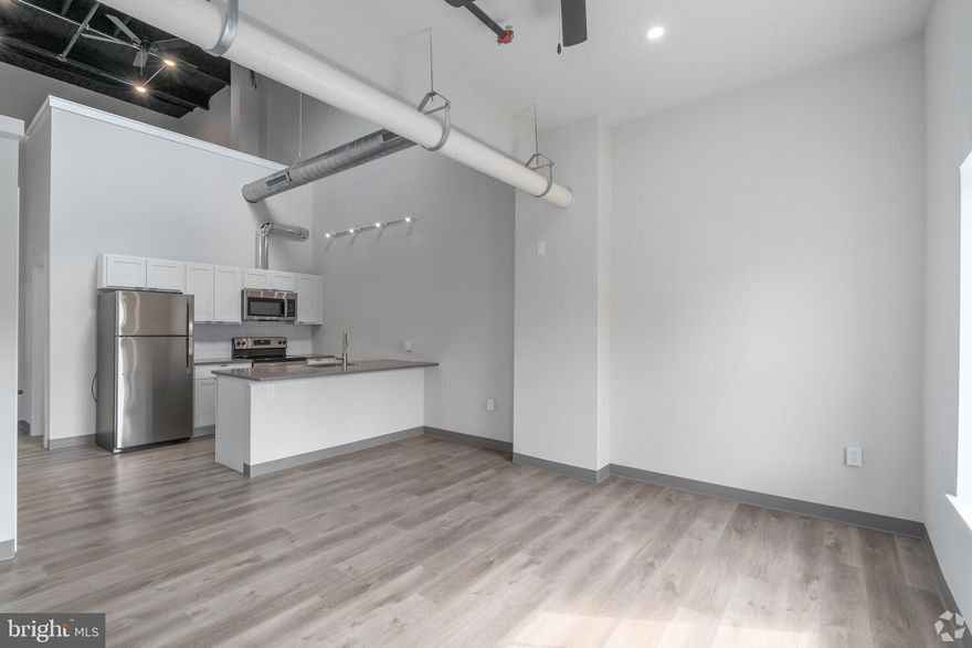 This new property is in the center of town, but two blocks removed from the busyness of Bridge Street. Onsite parking is available and these units are brand new. This former commercial building underwent a full conversion to apartments in 2022-2023 and was transformed into Phoenixville's newest boutique apartment building.

Unique setup in that every unit has its own exterior access either at grade level or from the catwalk. There are no shared hallways to walk through. The upper level units have dramatic high ceilings with loft storage space available as well.

(1 dog or 1 cat allowed, subject to a pet interview, breed restrictions, weight restrictions, additional upfront fee is not a deposit but a pet fee.)

All units have brand new and modern finishes, 4 piece kitchen appliance package, Quartz countertops, air conditioning, washer/dryers in the unit, Smart features, fire alarm, sprinkler systems and high ceilings. There is parking available for an additional monthly fee of $55. Don't pay for amenities elsewhere that you can't or won't use and come make this your new home in Phoenixville!