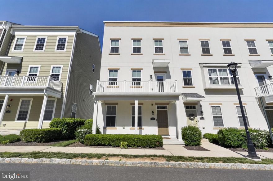 Welcome to 127 Prince George Street, a beautifully maintained contemporary townhome in the desirable Waterside community along the Delaware River. With more than 2,000 square feet of living space, this 3-bedroom, 2 full and 2 half bath home offers the perfect blend of modern style, comfort, and low-maintenance living.

From the moment you arrive, the inviting front porch featuring a Transylvania concrete coating system creates impressive curb appeal. Inside, hardwood flooring extends throughout the foyer, hallway, kitchen, and main living area. The open-concept main level is ideal for both entertaining and everyday living, featuring a spacious living room, dining area with upgraded lighting, and a beautifully appointed kitchen complete with granite countertops, stainless steel appliances, upgraded pendant lighting, custom window treatments, and a custom-built pantry for added storage and functionality. The sellers also recently upgraded the home with a brand-new stainless steel refrigerator, high-end washer and dryer, fresh paint throughout, and new carpeting on the stairs. Step outside onto the private second-floor balcony—perfect for relaxing with your morning coffee or unwinding at the end of the day.

The upper level features a spacious primary suite with a walk-in closet and private bath, along with two additional bedrooms and another full bathroom offering flexibility for guests, a home office, or additional living needs. The lower level includes a versatile bonus room currently used as an office that could easily function as a den, playroom, gym, or potential fourth bedroom, with direct access to the attached two-car garage.

One of the home’s standout features is the rooftop terrace with river views, creating an incredible space for entertaining or relaxing outdoors, complete with a convenient powder room on the top level.

Residents of Waterside enjoy a vibrant lifestyle with lawn care, snow removal, and trash services included, as well as scenic walking trails along the Delaware River and access to a stunning 8-acre waterfront park. Conveniently located near I-95, the PA Turnpike, public transportation, and New Jersey bridges, this exceptional home offers both convenience and community in one of the area’s most desirable waterfront neighborhoods.