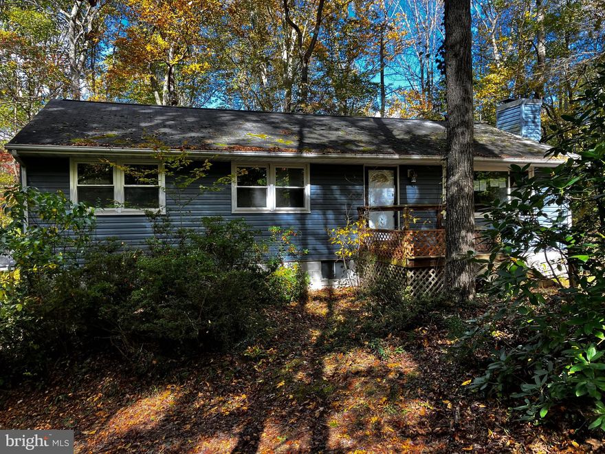 Discover your private oasis in this charming rambler nestled on 5 acres of serene woodland. Enveloped by a lush canopy of trees, this secluded haven offers endless opportunities to customize and add your personal touch. As you approach the property, a long, winding driveway leads you to the picturesque setting of the rambler. With its abundant greenery, this home exudes a peaceful ambiance that is perfect for nature enthusiasts and those seeking tranquility. Inside, the interior is a canvas ready for your creativity. With an open floor plan, this home provides the ideal foundation for your design dreams. Imagine a cozy fireplace in the spacious living room, a gourmet kitchen with modern appliances, and luxurious bathrooms that cater to your desires. Step outside, and you'll find a sprawling 5-acre landscape just waiting to be transformed into your dream outdoor space. Create walking trails, build a deck for al fresco dining, or establish a garden paradise. Don't miss the chance to make this enchanting rambler your own and put the finishing touches that will turn it into your personalized retreat. Embrace the beauty of nature and the potential for a truly unique and captivating living experience.