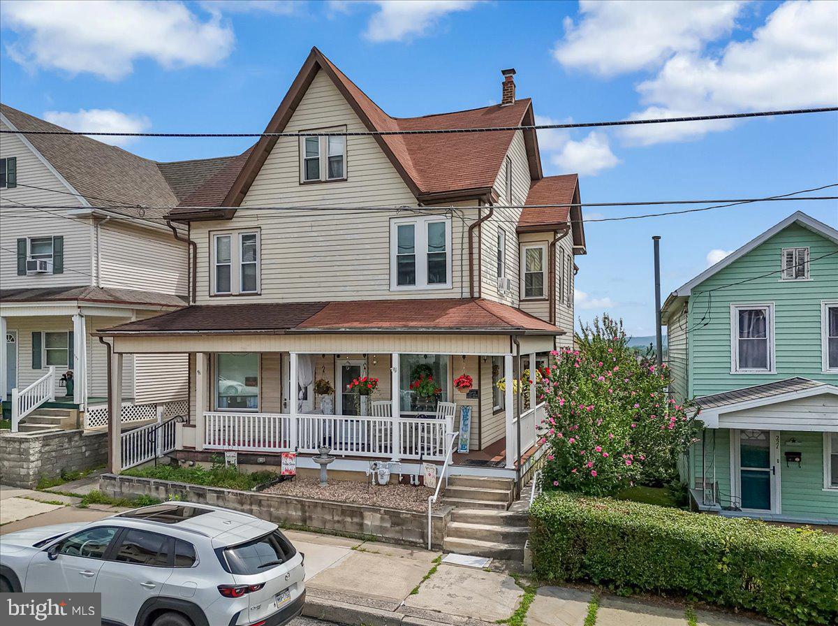 Nestled in the heart of Lehighton, this charming 3-bedroom, 2-full-bath twin offers a perfect blend of comfort and convenience. Step inside to find a freshly painted interior complemented by brand-new carpeting in the living room and primary bedroom. The second-floor bathroom has been beautifully renovated, featuring a modern walk-in shower, updated vanity, and new flooring. The efficient kitchen boasts stainless steel appliances and flows seamlessly into a first-floor mudroom/laundry area—adding function to everyday living. The current owner has upgraded the furnace to natural gas, providing economical heating throughout the seasons. An expandable third floor offers the potential for additional living space, perfect for a home office, playroom, or guest suite. Outside, enjoy your morning coffee or unwind on the rear covered deck while taking in scenic mountain views. A detached 1-car garage adds convenience and storage. Located just a short distance to the D&L Trail, downtown park, and historic Jim Thorpe, this home puts outdoor adventure, local shops, and dining right at your doorstep. Don’t miss your chance to own this well-maintained gem in a prime location!